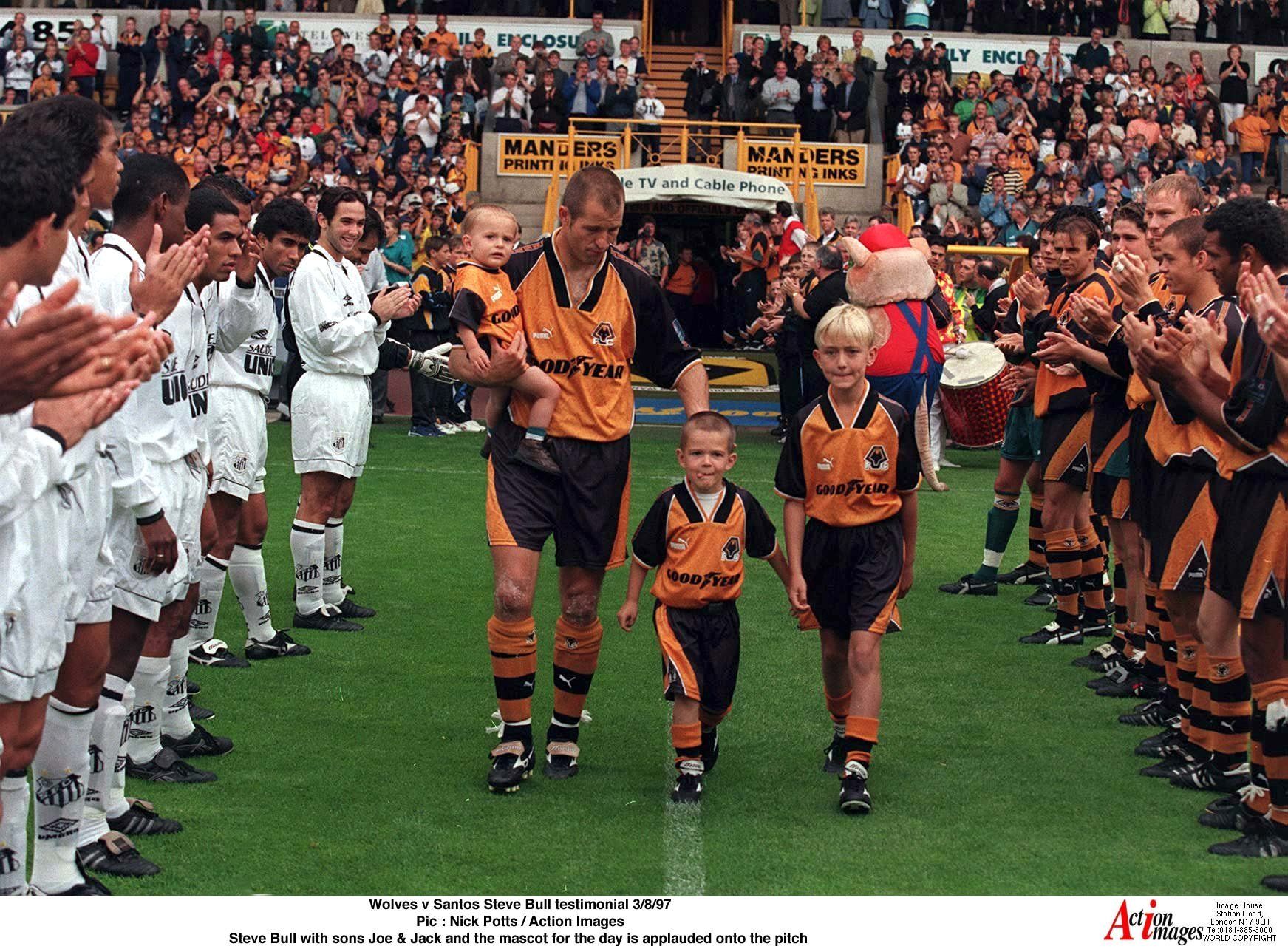Wolves v Santos Steve Bull testimonial 3/8/97 
Pic : Nick Potts / Action Images 
Steve Bull with sons Joe &amp; Jack and the mascot for the day is applauded onto the pitch  
wolverhampton wanderers