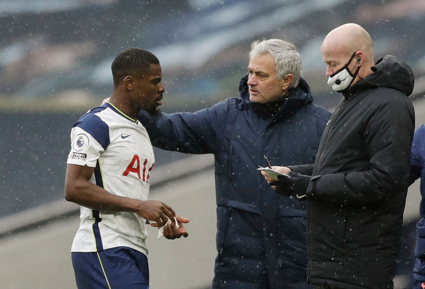 Soccer Football - Premier League - Tottenham Hotspur v West Bromwich Albion - Tottenham Hotspur Stadium, London, Britain - February 7, 2021 Tottenham Hotspur's Serge Aurier with manager Jose Mourinho after being substituted Pool via REUTERS/Matt Dunham EDITORIAL USE ONLY. No use with unauthorized audio, video, data, fixture lists, club/league logos or 'live' services. Online in-match use limited to 75 images, no video emulation. No use in betting, games or single club /league/player publications