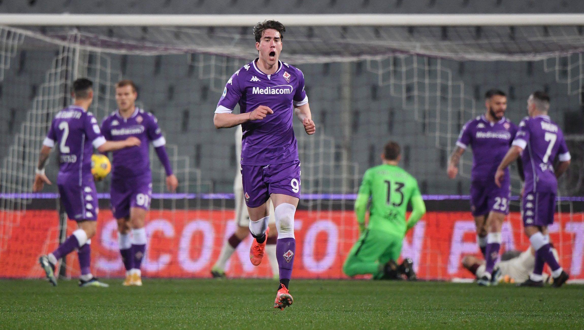 Fiorentina's Dusan Vlahovic celebrates after AS Roma's Leonardo Spinazzola scored an own goal