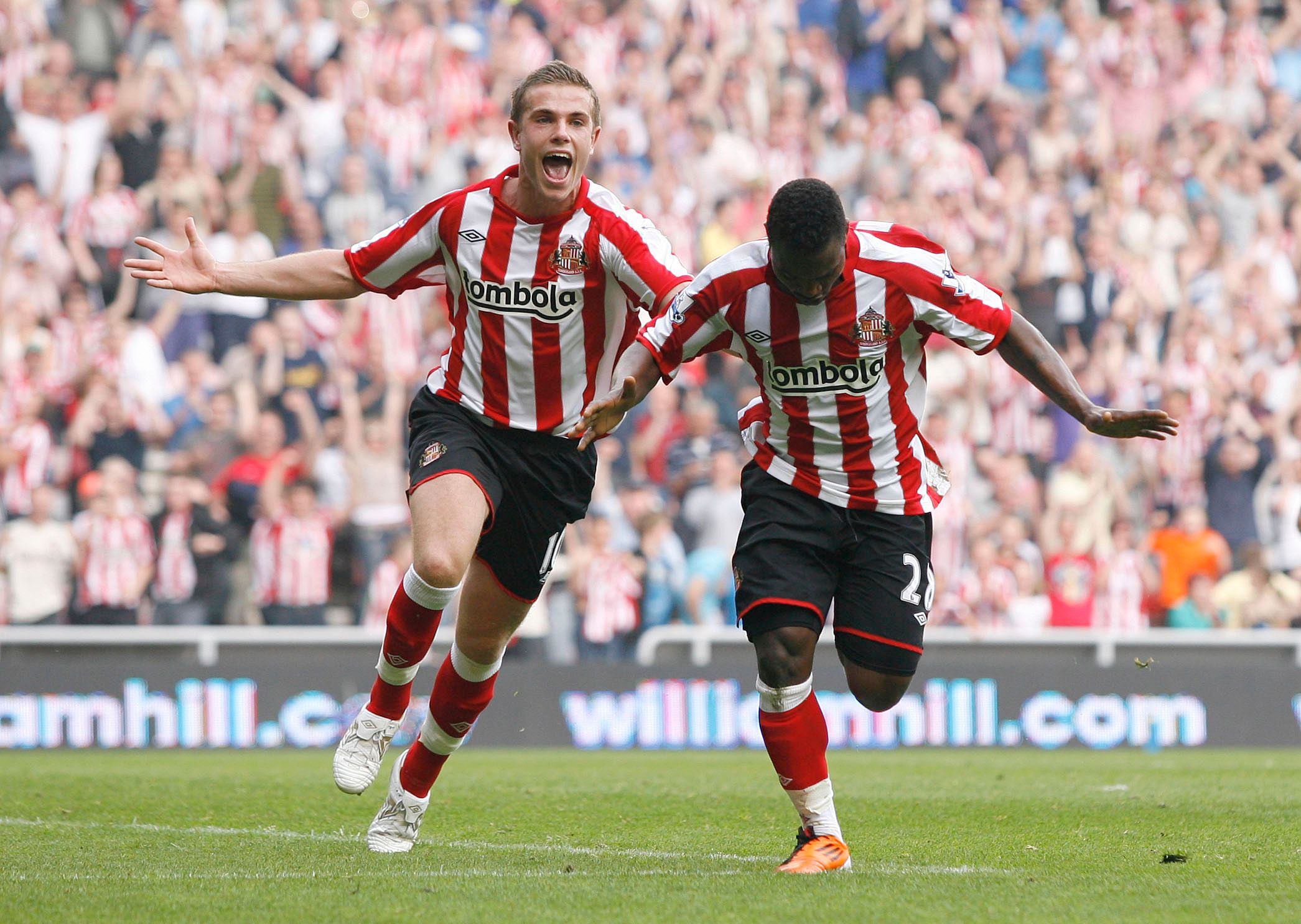 Football - Sunderland v Wigan Athletic Barclays Premier League - Stadium of Light - 10/11 - 23/4/11 
Stephane Sessegnon (R) celebrates with Jordan Henderson after scoring Sunderland's third goal from a penalty 
Mandatory Credit: Action Images / Ed Sykes 
Livepic 
NO ONLINE/INTERNET USE WITHOUT A LICENCE FROM THE FOOTBALL DATA CO LTD. FOR LICENCE ENQUIRIES PLEASE TELEPHONE +44 (0) 207 864 9000.