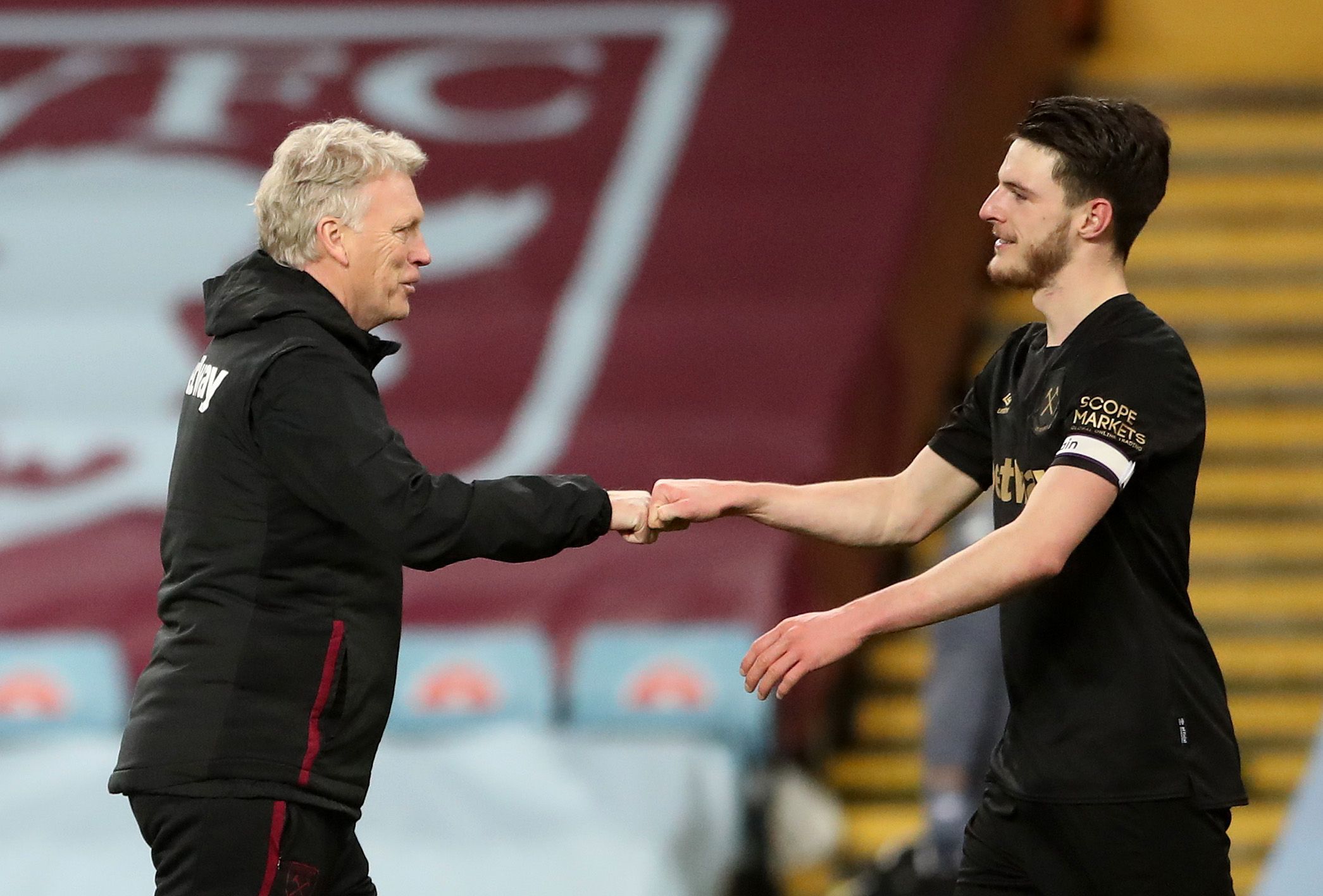 Soccer Football - Premier League - Aston Villa v West Ham United - Villa Park, Birmingham, Britain - February 3, 2021 West Ham United's Declan Rice celebrates with manager David Moyes at the end of the match Pool via REUTERS/Nick Potts EDITORIAL USE ONLY. No use with unauthorized audio, video, data, fixture lists, club/league logos or 'live' services. Online in-match use limited to 75 images, no video emulation. No use in betting, games or single club /league/player publications.  Please contact