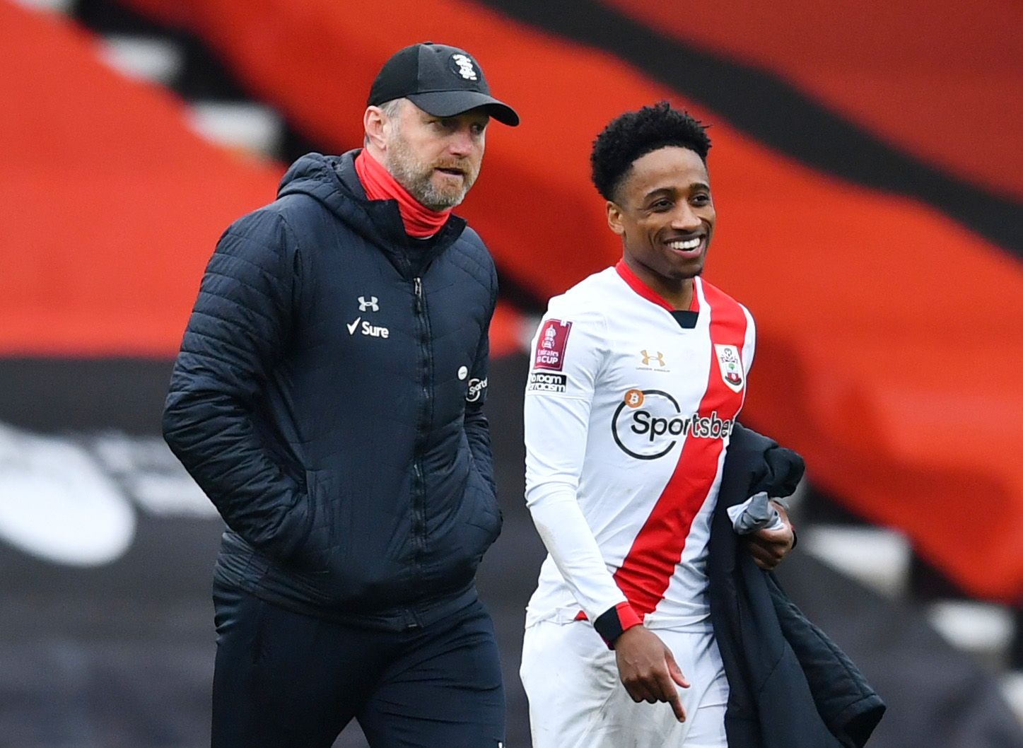Soccer Football - FA Cup Quarter Final - AFC Bournemouth v Southampton - Vitality Stadium, Bournemouth, Britain - March 20, 2021 Southampton manager Ralph Hasenhuttl with Kyle Walker-Peters after the match REUTERS/Dylan Martinez