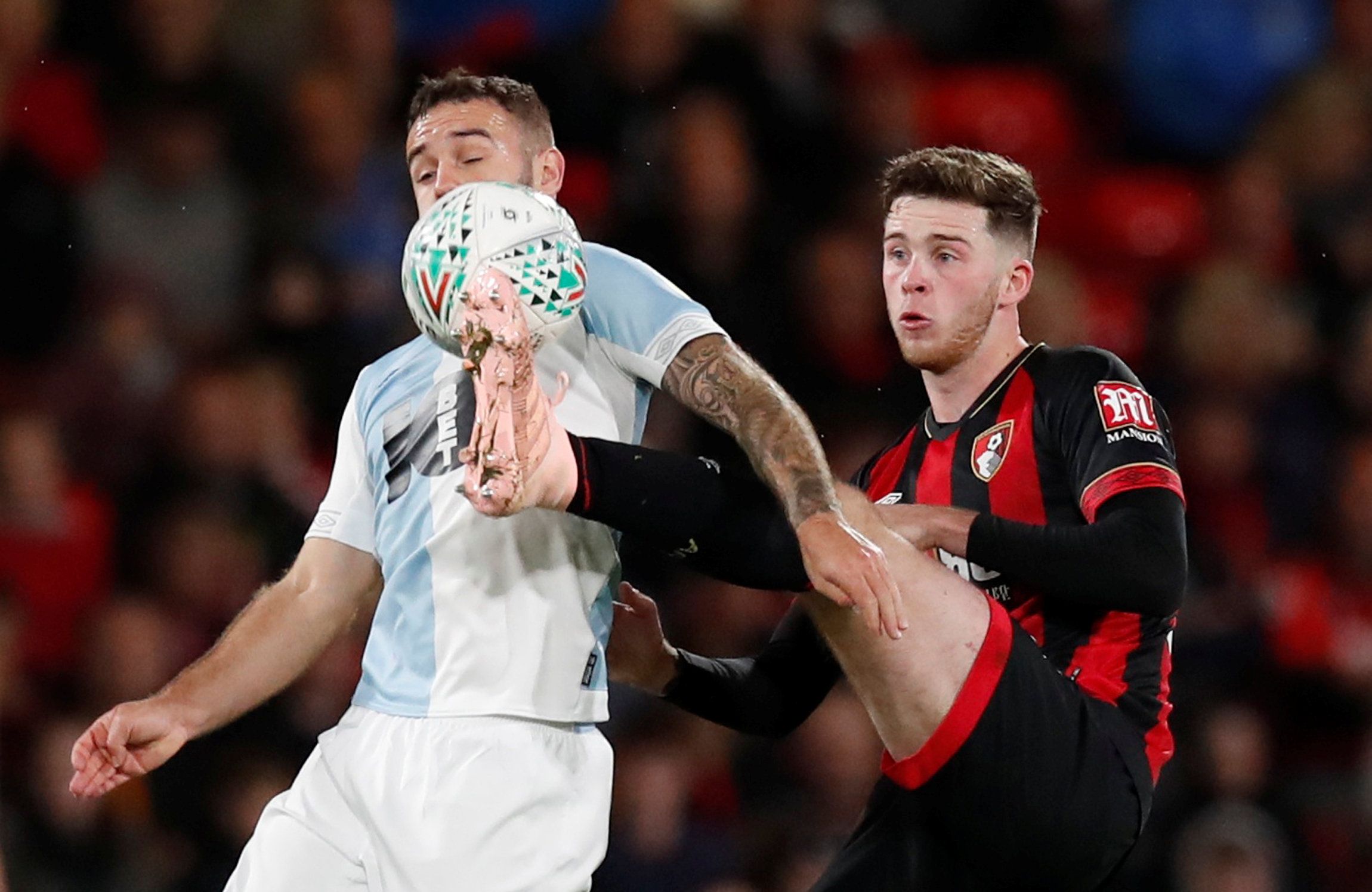 Soccer Football - Carabao Cup - Third Round - AFC Bournemouth v Blackburn Rovers - Vitality Stadium, Bournemouth, Britain - September 25, 2018  Blackburn Rovers' Adam Armstrong in action with Bournemouth's Jack Simpson          Action Images via Reuters/Peter Cziborra  EDITORIAL USE ONLY. No use with unauthorized audio, video, data, fixture lists, club/league logos or 