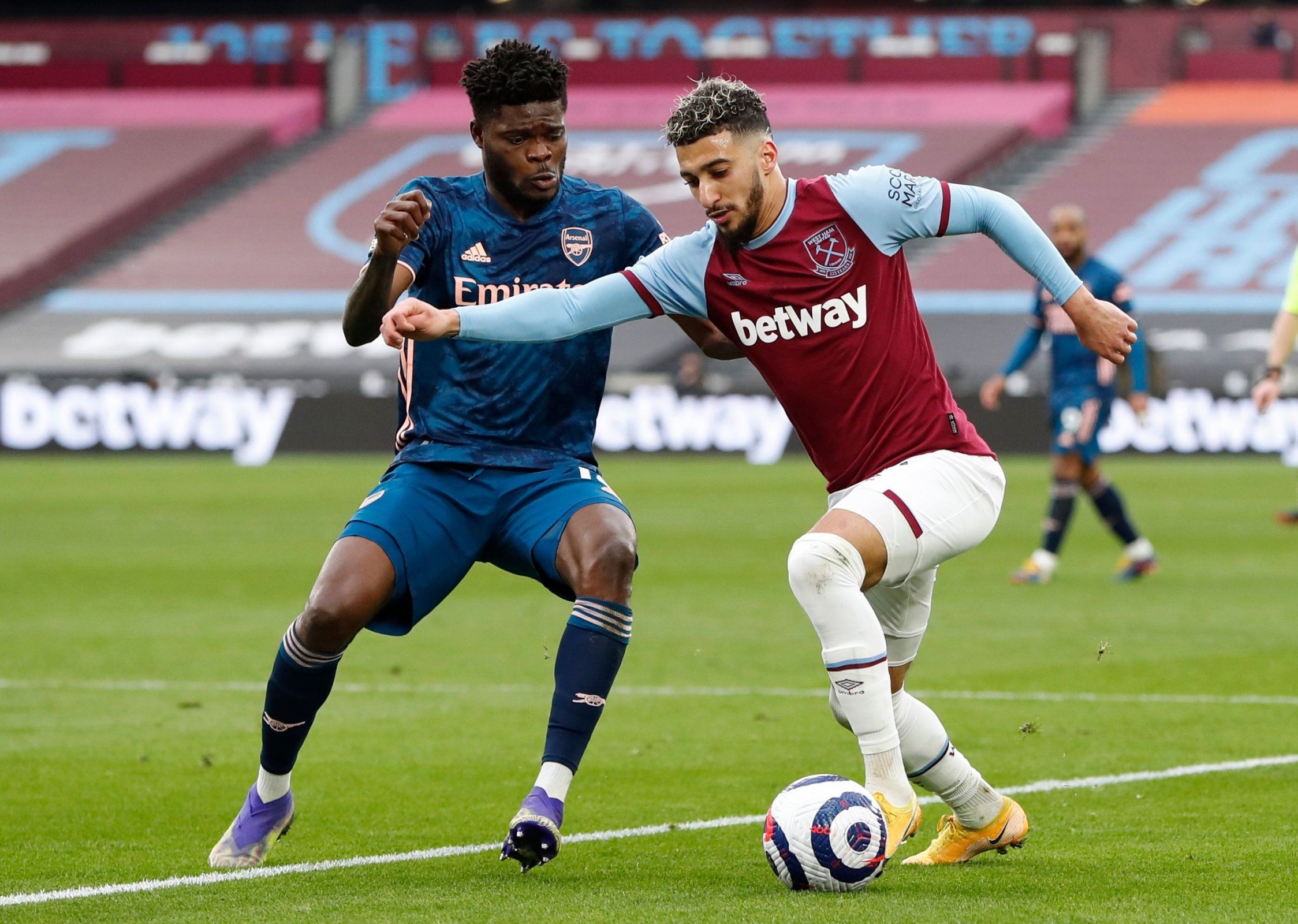 West Ham United's Said Benrahma in action with Arsenal's Thomas Partey