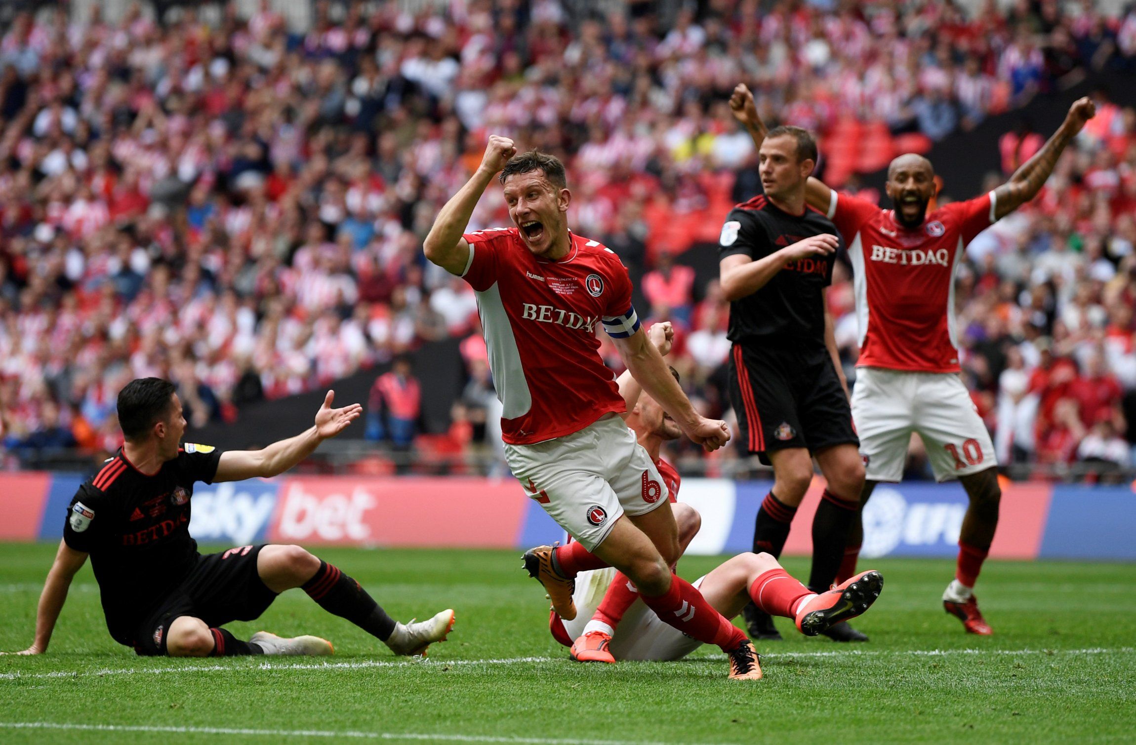 charlton athletic captain jason pearce wheels away in celebration as patrick bauer scores vs sunderland playoff final league one