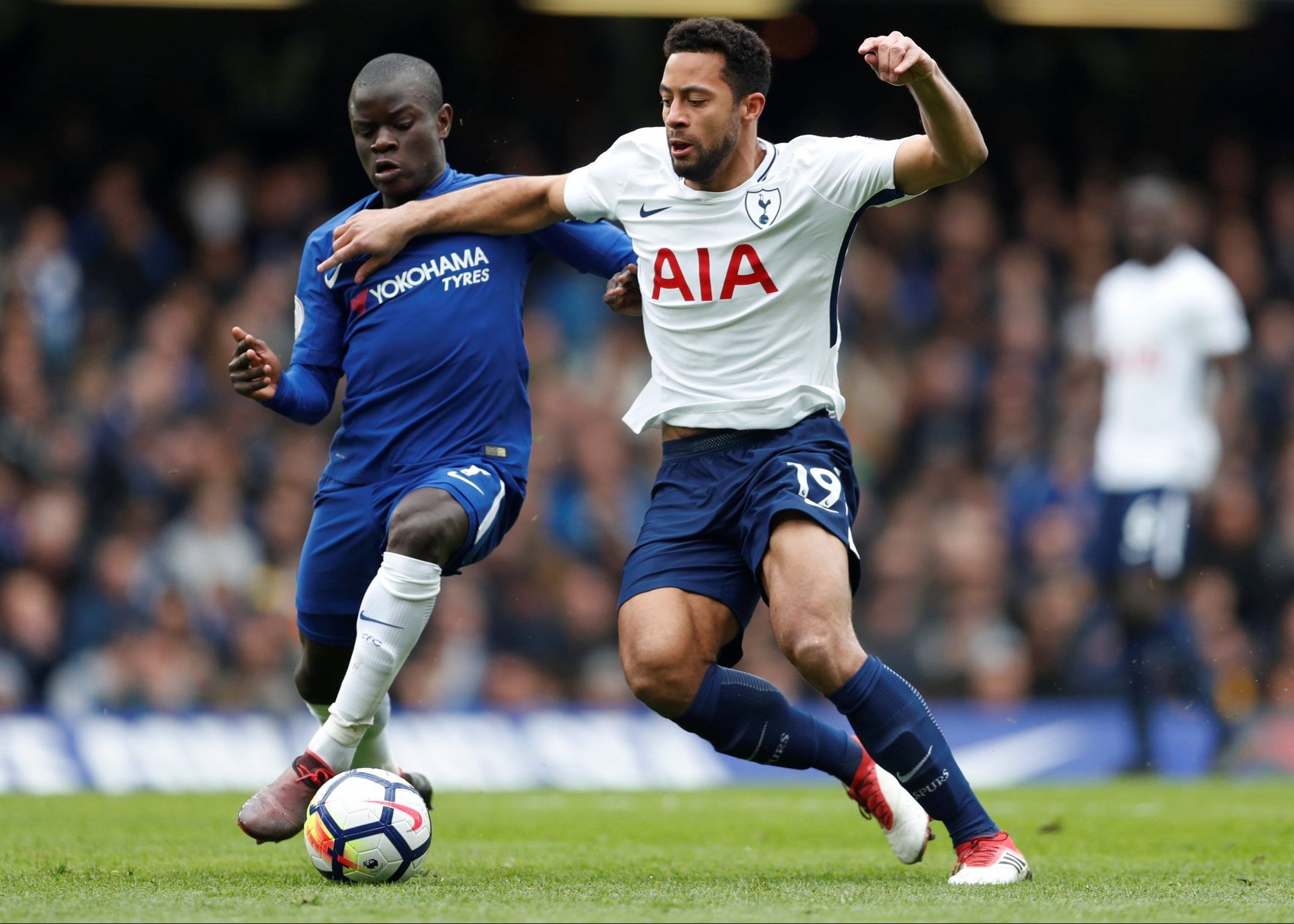 former spurs midfielder mousa dembele in action with ngolo kante premier league
