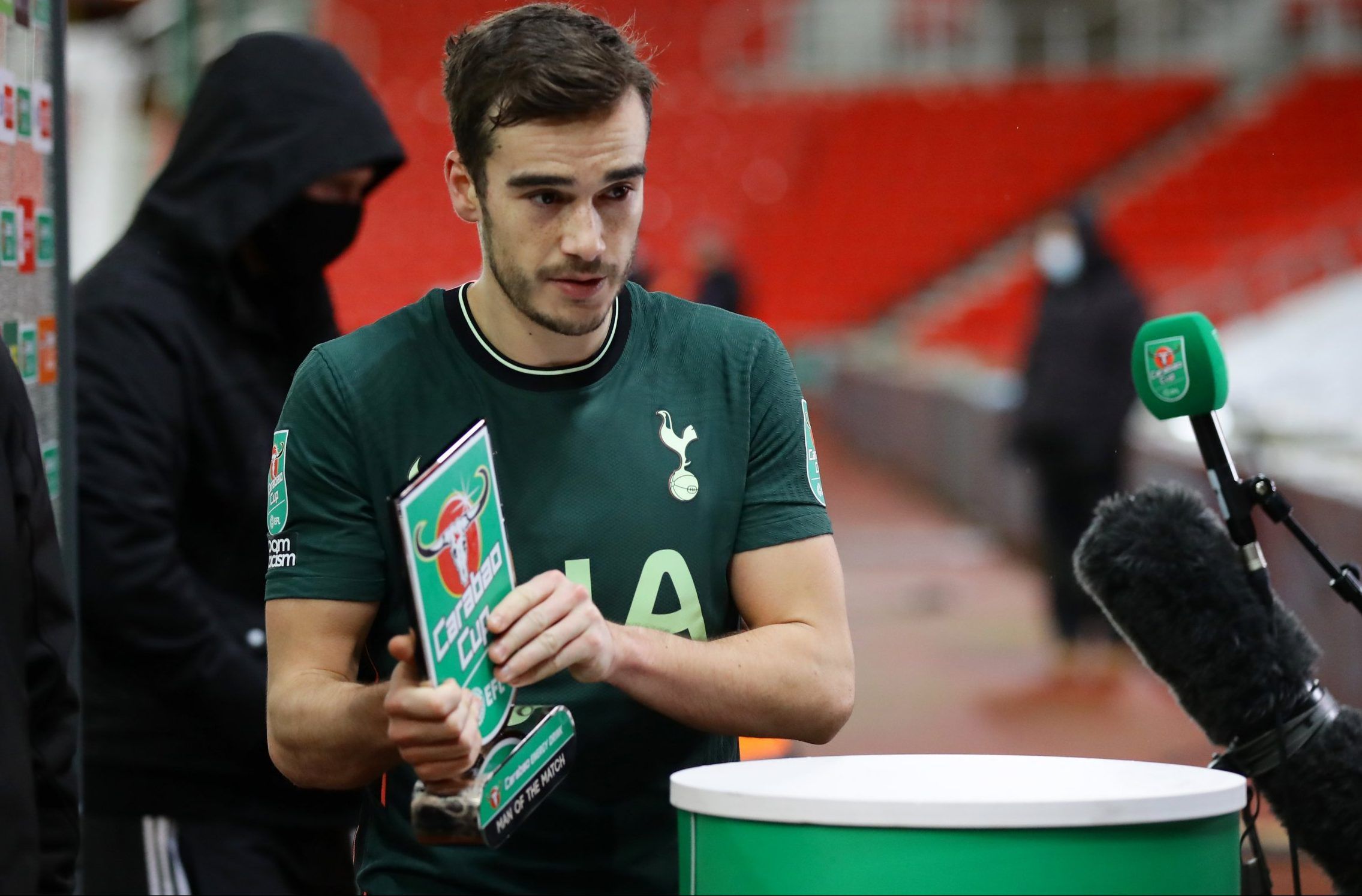 harry winks with carabao cup man of the match award after spurs beat stoke city quarter final