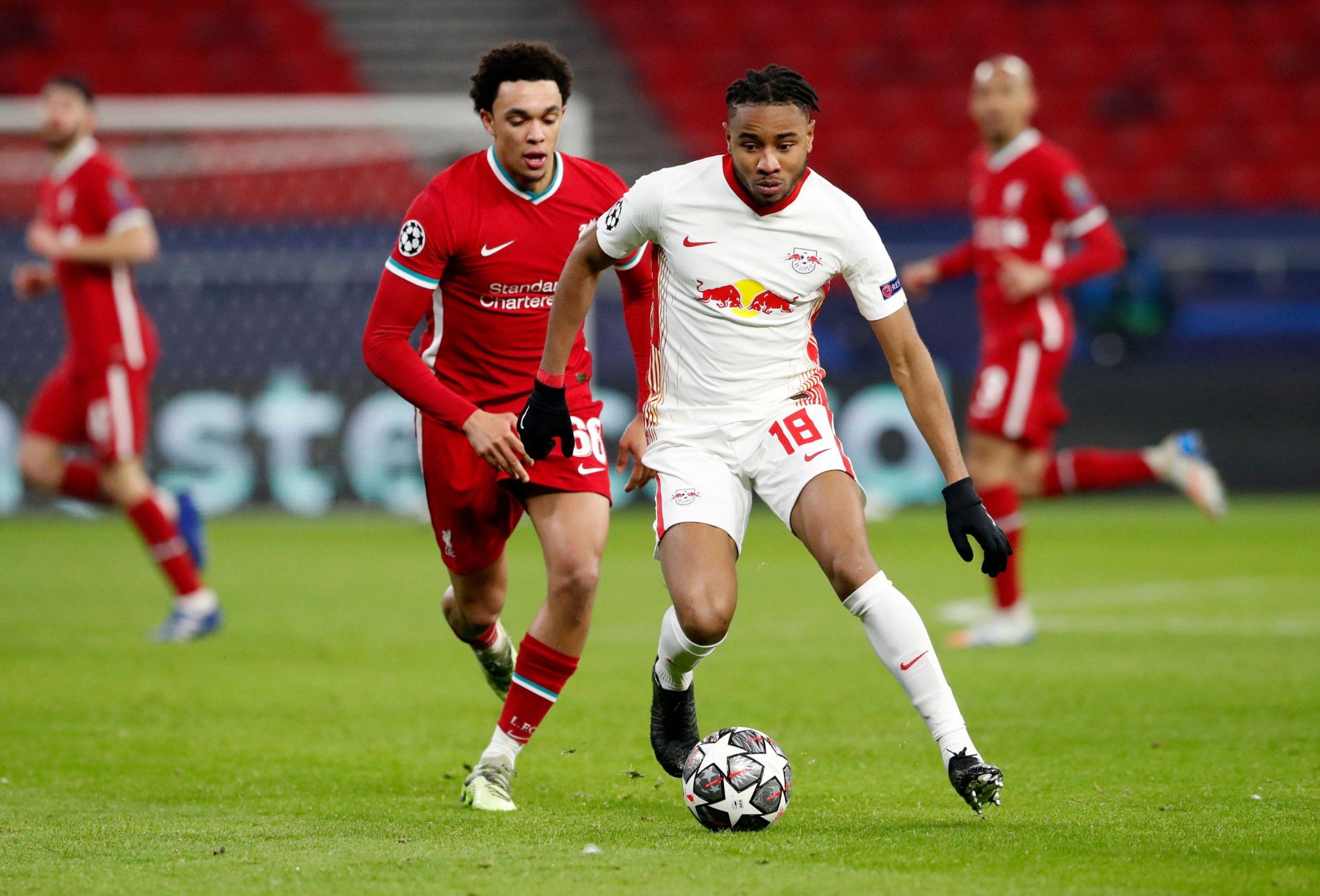 rb leipzig christopher nkunku in action against liverpool trent alexander arnold champions league spurs transfer target rumours