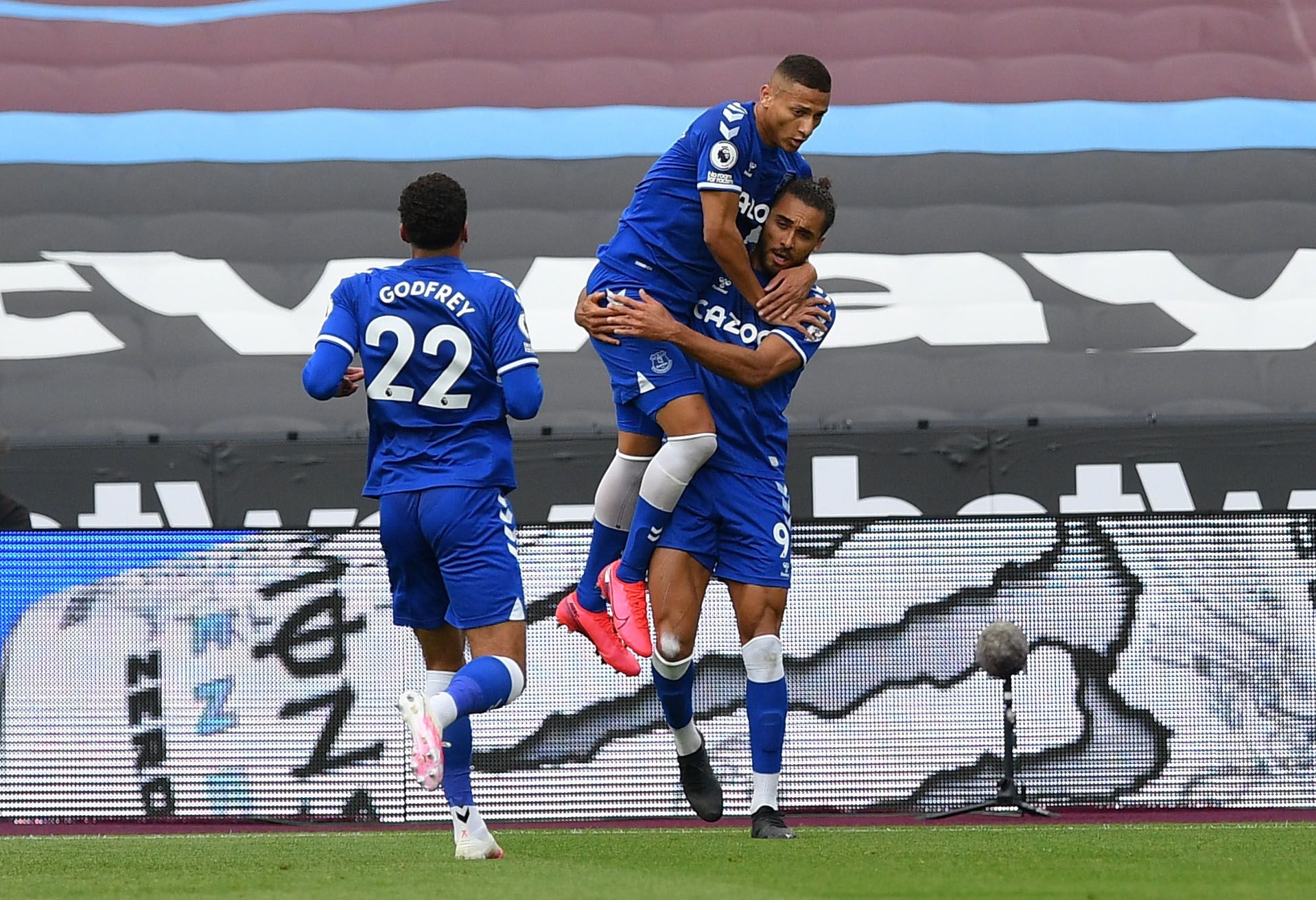 Soccer Football - Premier League - West Ham United v Everton - London Stadium, London, Britain - May 9, 2021 Everton's Dominic Calvert-Lewin celebrates scoring their first goal with Richarlison Pool via REUTERS/Justin Tallis EDITORIAL USE ONLY. No use with unauthorized audio, video, data, fixture lists, club/league logos or 'live' services. Online in-match use limited to 75 images, no video emulation. No use in betting, games or single club /league/player publications.  Please contact your accou