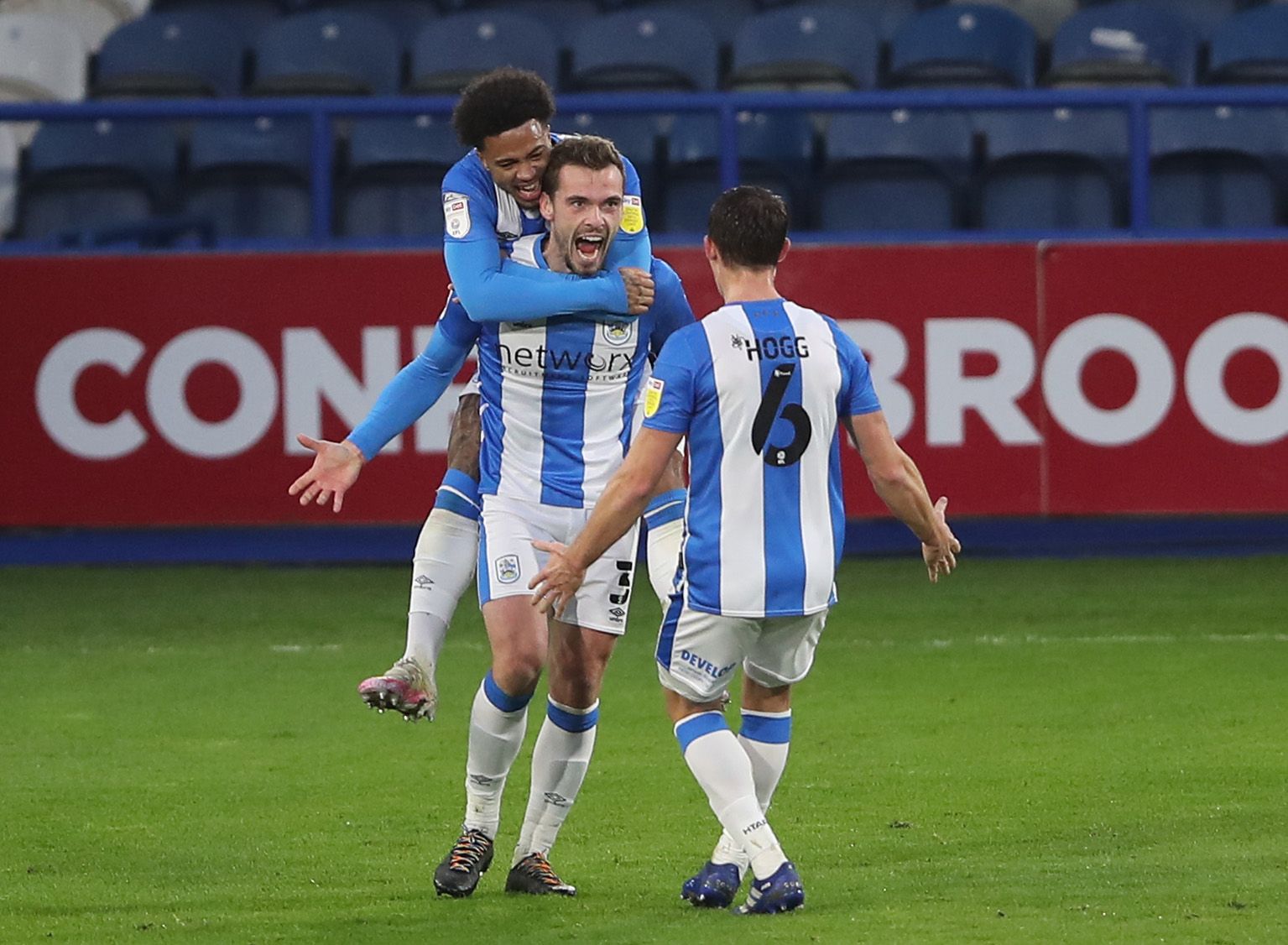 Soccer Football - Championship - Huddersfield Town v Queens Park Rangers - John Smith's Stadium, Huddersfield, Britain - December 5, 2020 Huddersfield Town's Harry Toffolo celebrates after scoring their second goal with teammates Action Images/Molly Darlington EDITORIAL USE ONLY. No use with unauthorized audio, video, data, fixture lists, club/league logos or 'live' services. Online in-match use limited to 75 images, no video emulation. No use in betting, games or single club /league/player publ