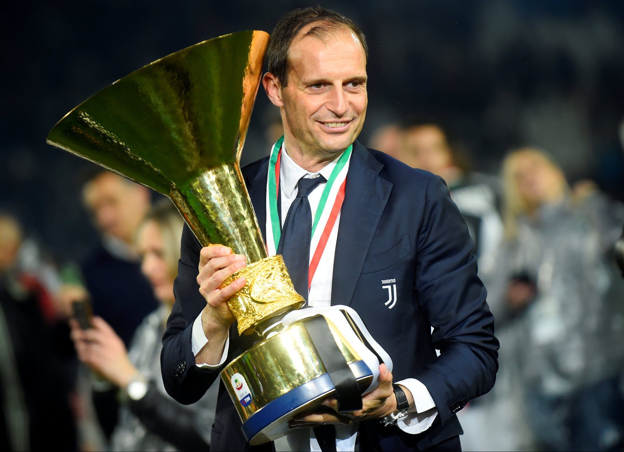 juventus head coach massimilinao allegri holding serie a trophy