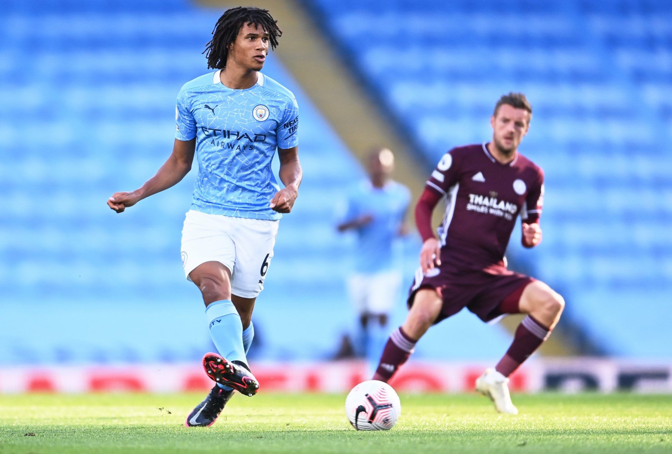 man city defender nathan ake in action against leicester city in the premier league