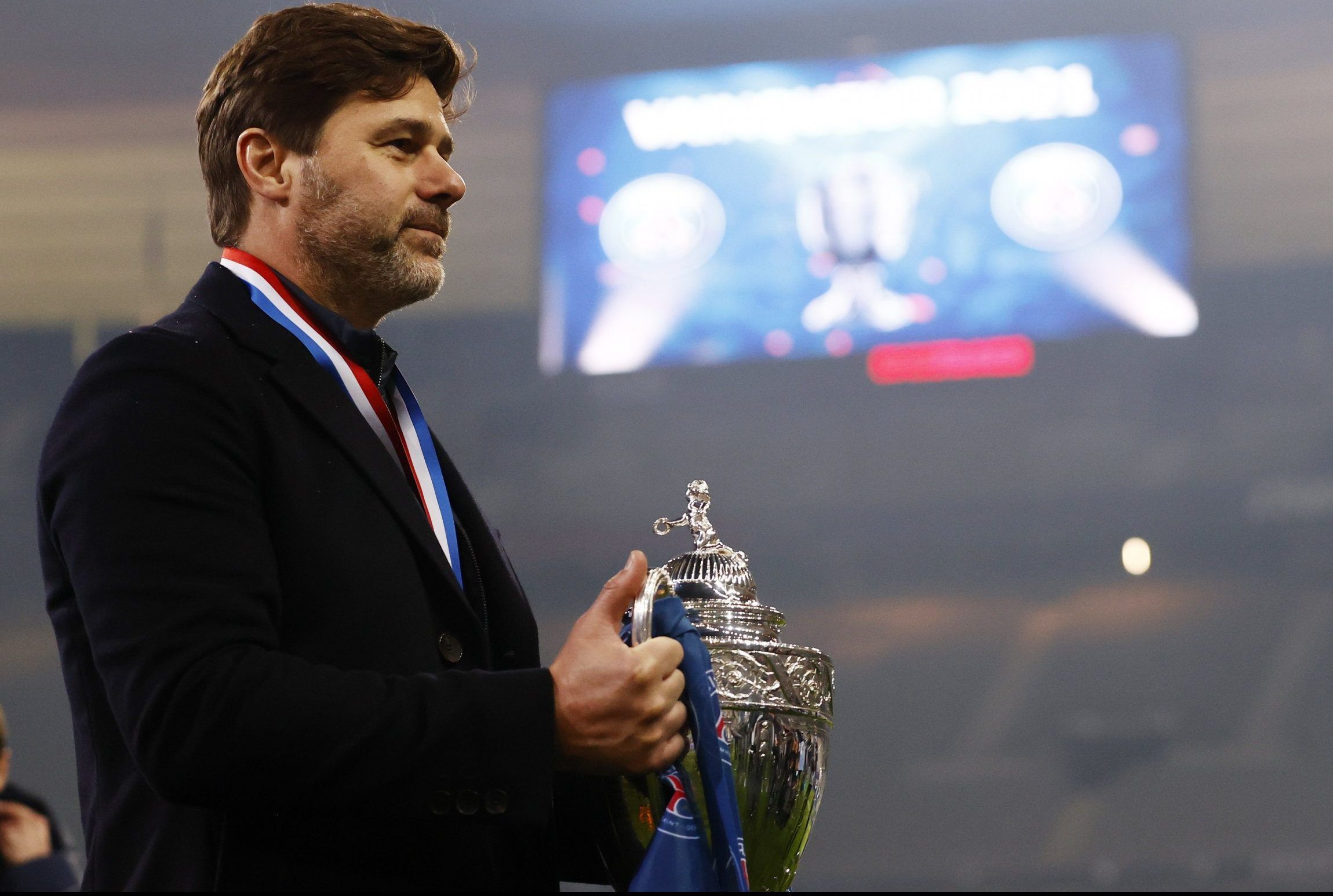 paris saint germain manager mauricio pochettino with the french cup after final win