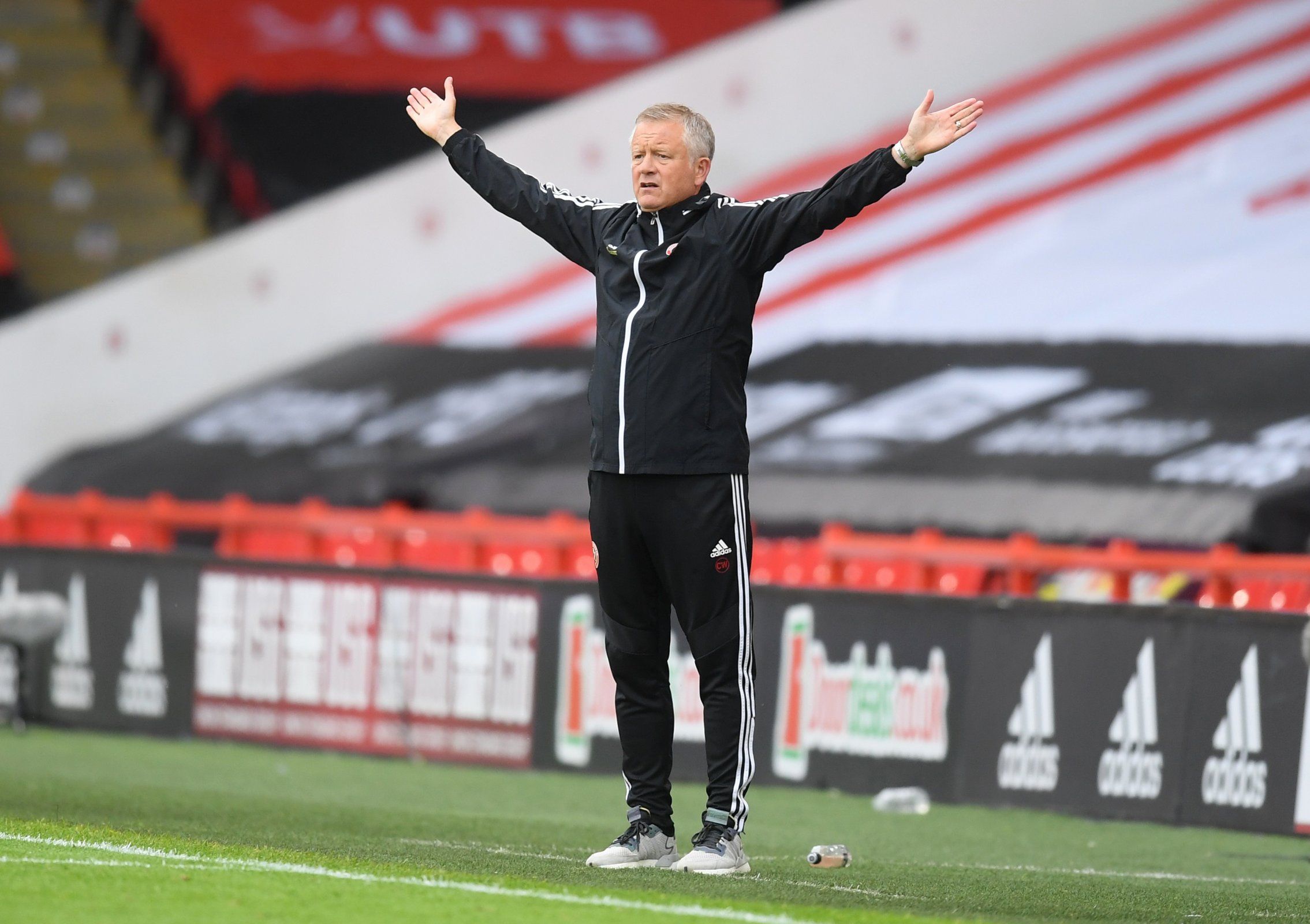 sheffield united manager chris wilder on sideline against spurs in the premier league