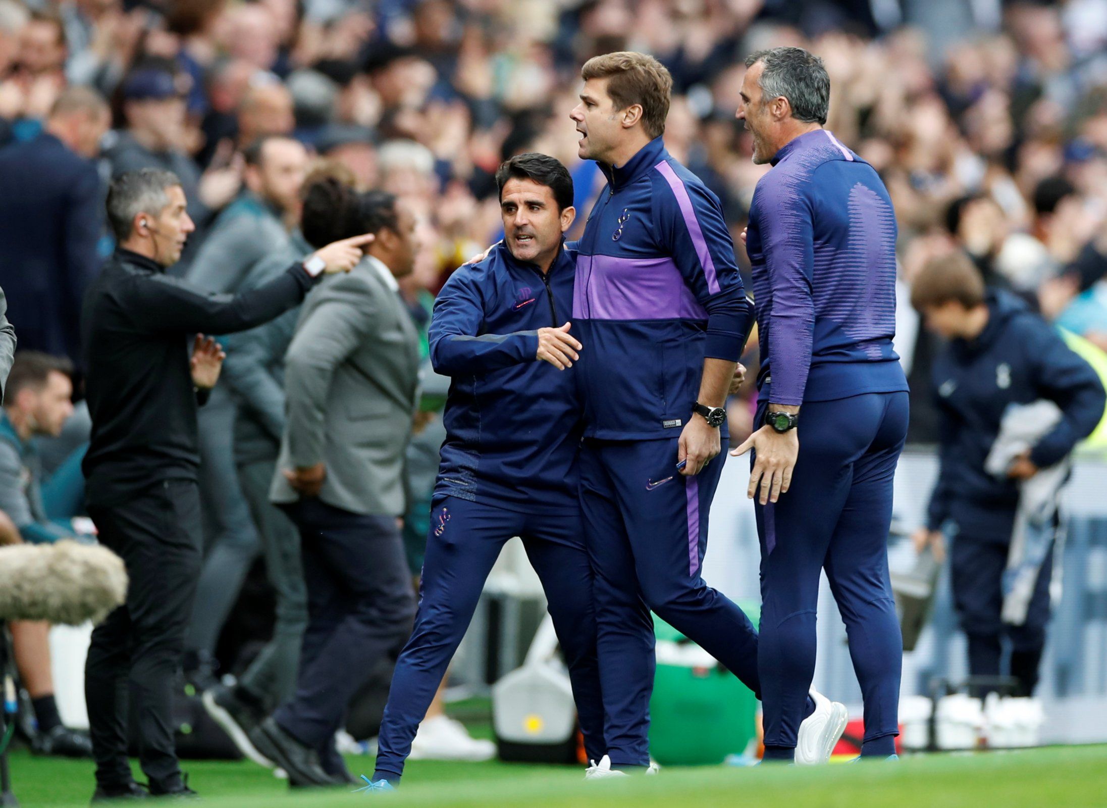 spurs boss mauricio pochettino celebrates with coaches after win over southampton in the premier league