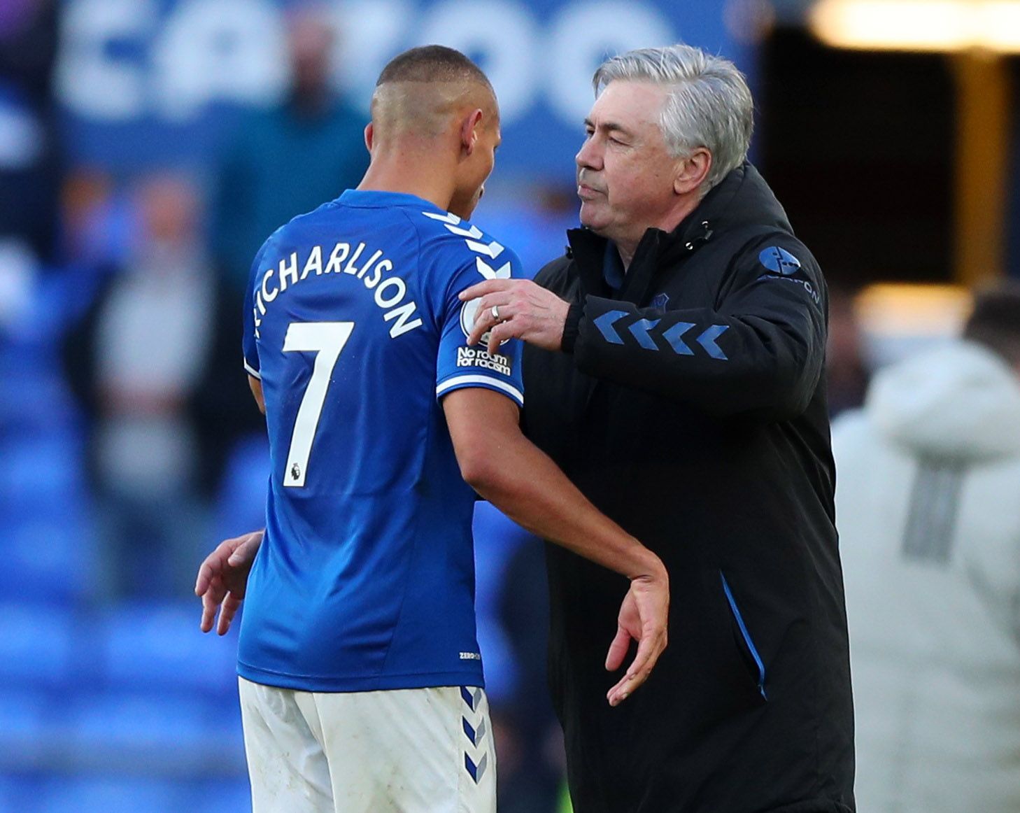 Soccer Football - Premier League - Everton v Wolverhampton Wanderers - Goodison Park, Liverpool, Britain - May 19, 2021 Everton manager Carlo Ancelotti with Richarlison after the match Pool via REUTERS/Peter Byrne EDITORIAL USE ONLY. No use with unauthorized audio, video, data, fixture lists, club/league logos or 'live' services. Online in-match use limited to 75 images, no video emulation. No use in betting, games or single club /league/player publications.  Please contact your account represen