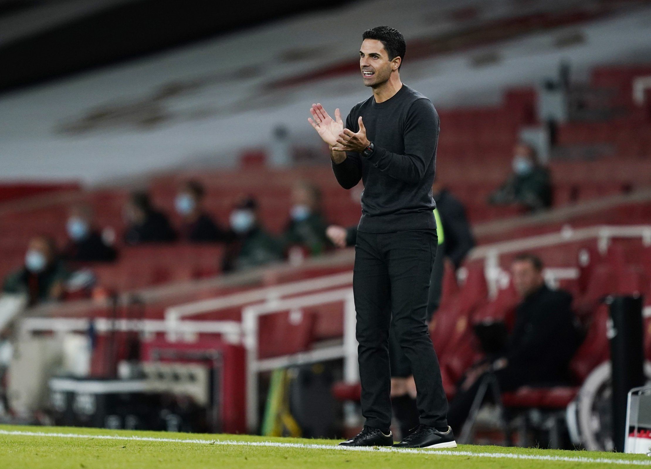 arsenal manager mikel arteta looks on during premier league clash with west ham united