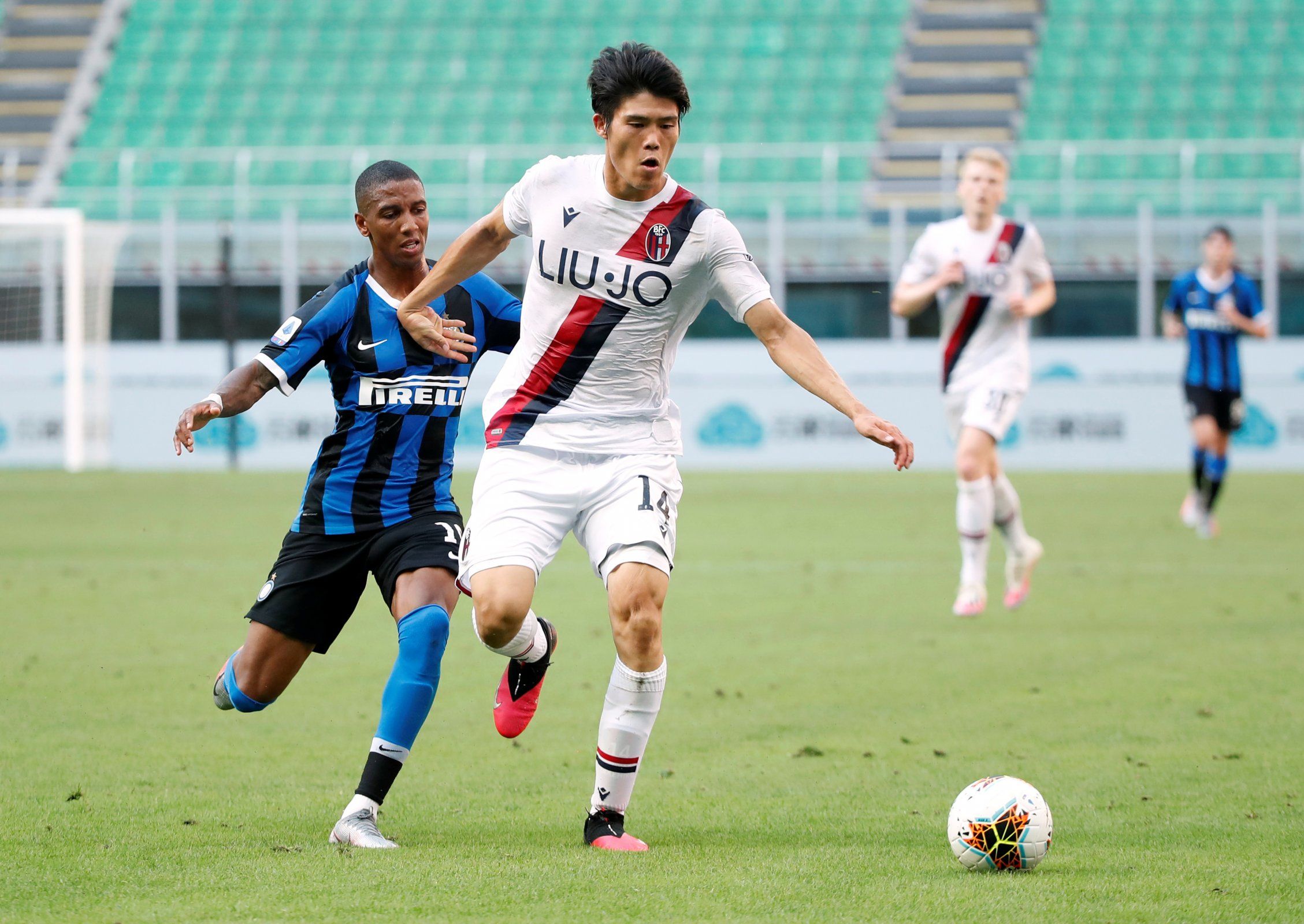 bologna defender takehiro tomiyasu in action against juventus serie a