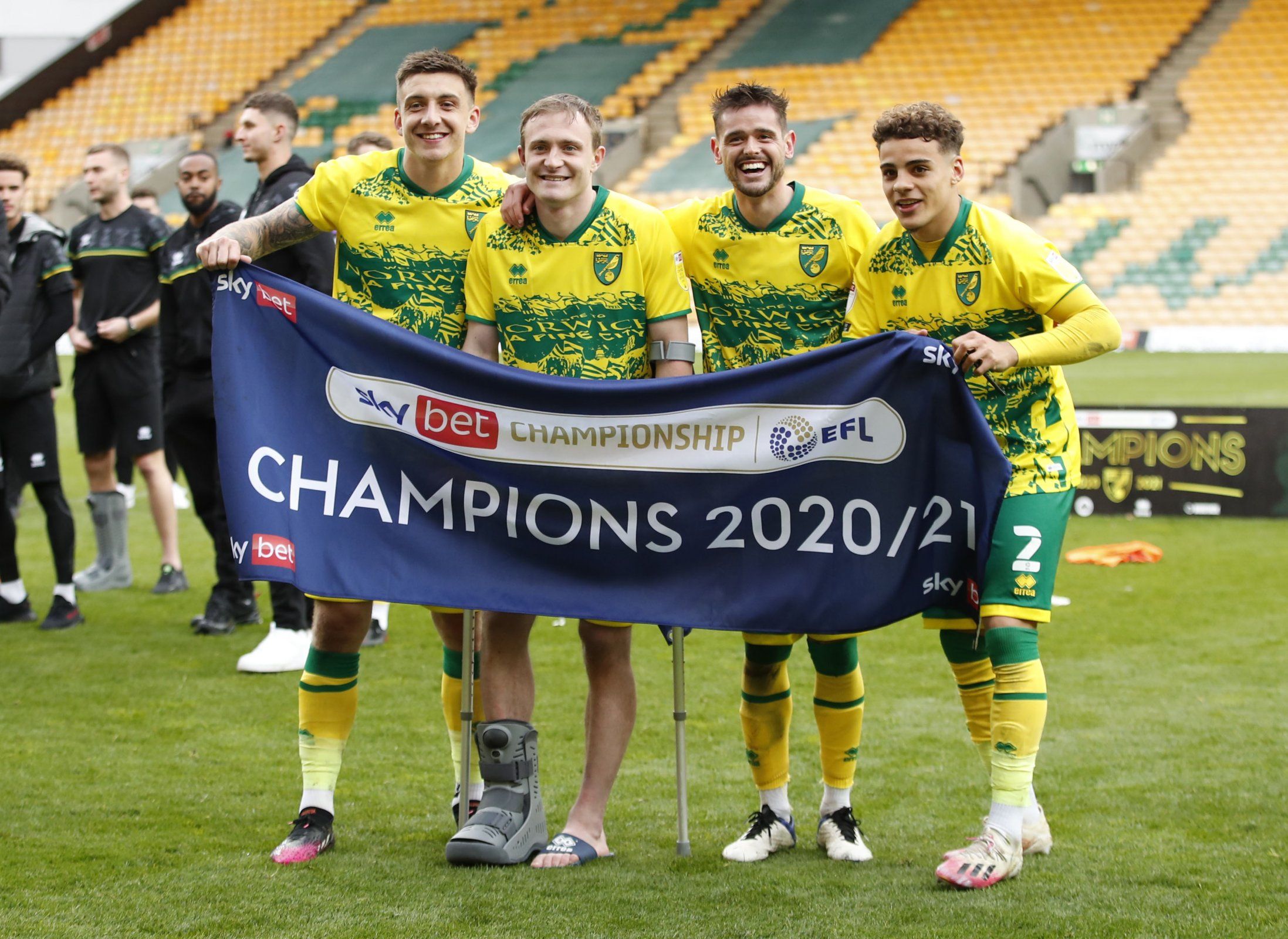spurs loanee oliver skipp celebrates norwich city title promotion with teammates max aarons jordan hugill and xavier quintilla