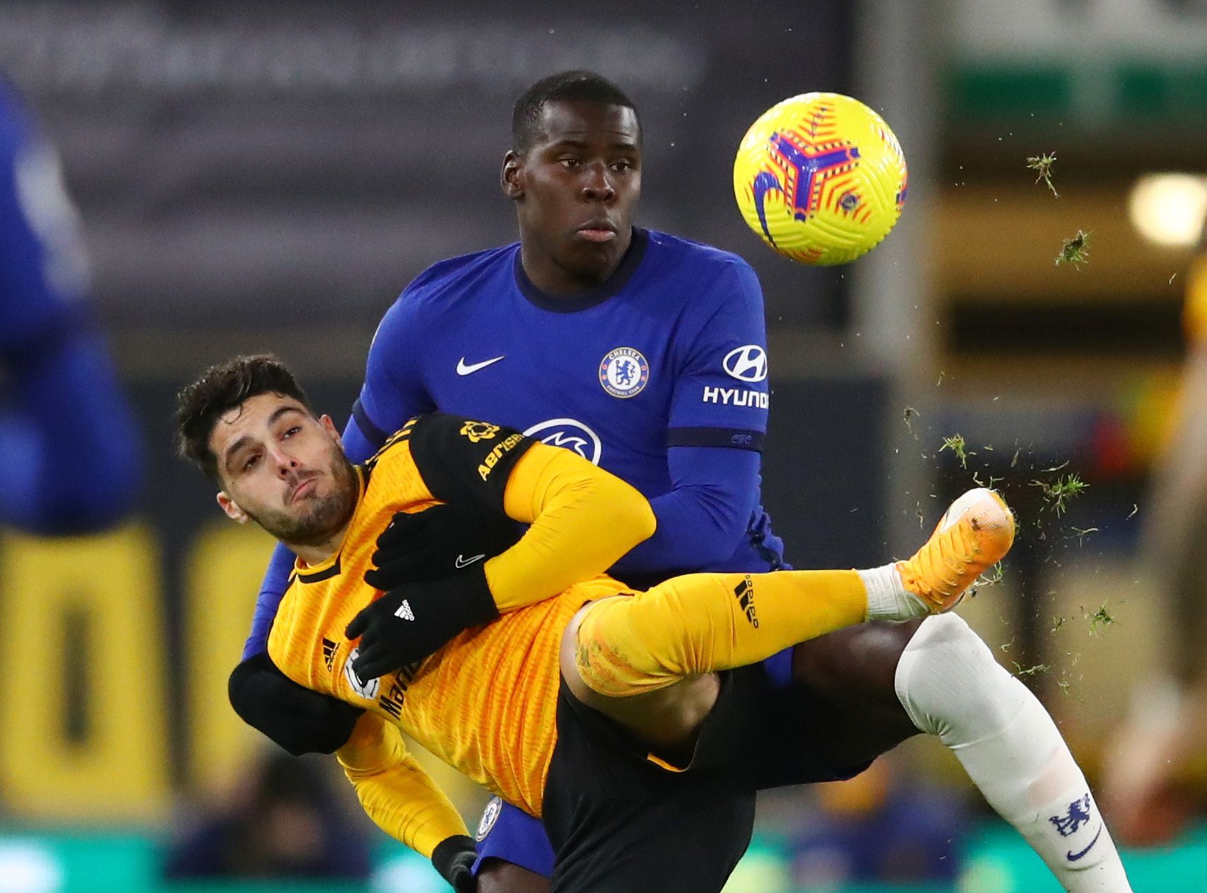 Soccer Football - Premier League - Wolverhampton Wanderers v Chelsea - Molineux Stadium, Wolverhampton, Britain - December 15, 2020 Wolverhampton Wanderers' Pedro Neto in action with Chelsea's Kurt Zouma Pool via REUTERS/Michael Steele EDITORIAL USE ONLY. No use with unauthorized audio, video, data, fixture lists, club/league logos or 'live' services. Online in-match use limited to 75 images, no video emulation. No use in betting, games or single club /league/player publications.  Please contact