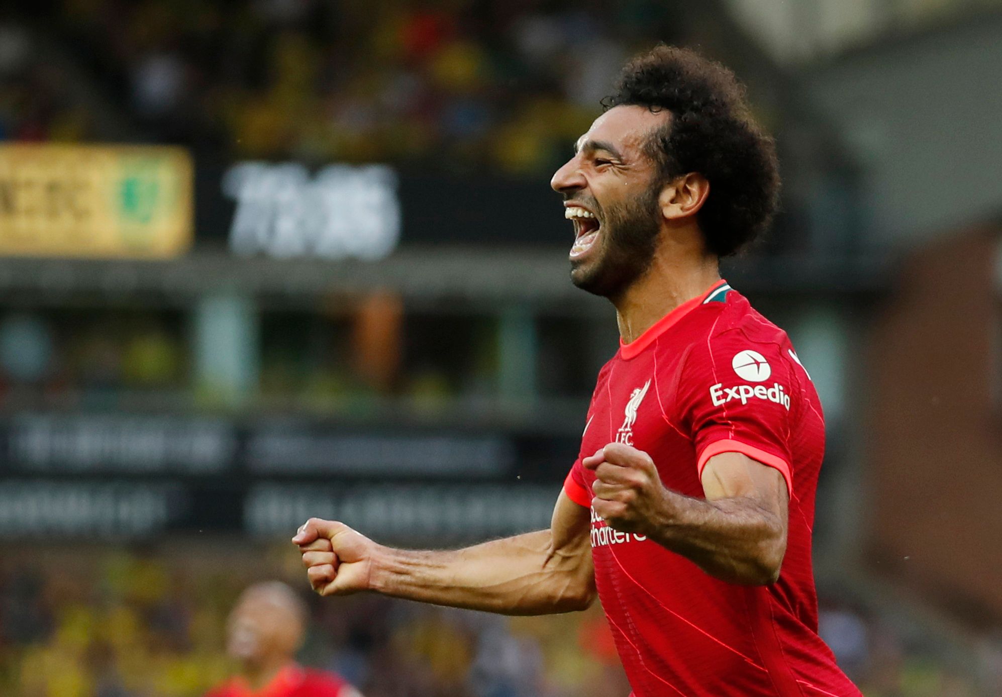 Soccer Football - Premier League - Norwich City v Liverpool - Carrow Road, Norwich, Britain - August 14, 2021 Liverpool's Mohamed Salah  celebrates scoring their third goal Action Images via Reuters/Peter Cziborra EDITORIAL USE ONLY. No use with unauthorized audio, video, data, fixture lists, club/league logos or 'live' services. Online in-match use limited to 75 images, no video emulation. No use in betting, games or single club /league/player publications.  Please contact your account represen
