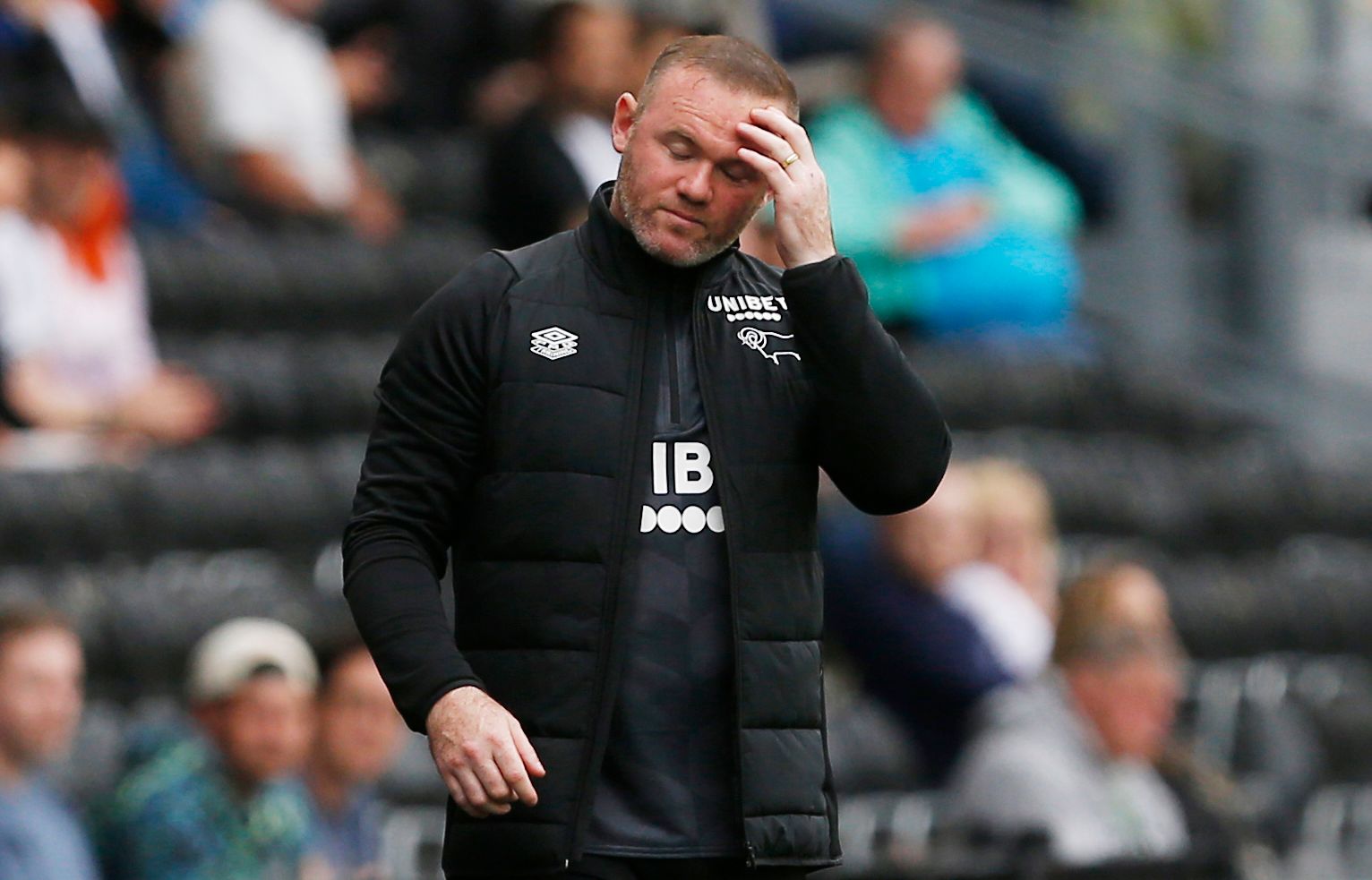 Soccer Football - Championship - Derby County v Huddersfield Town - Pride Park, Derby, Britain - August 7, 2021  Derby County manager Wayne Rooney reacts Action Images/Craig Brough