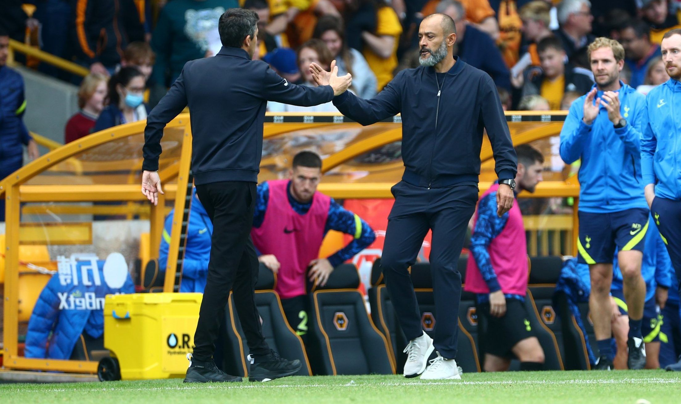 Tottenham boss Nuno Santo shakes hands with Wolves boss Bruno Lage after Premier League win at Molineux