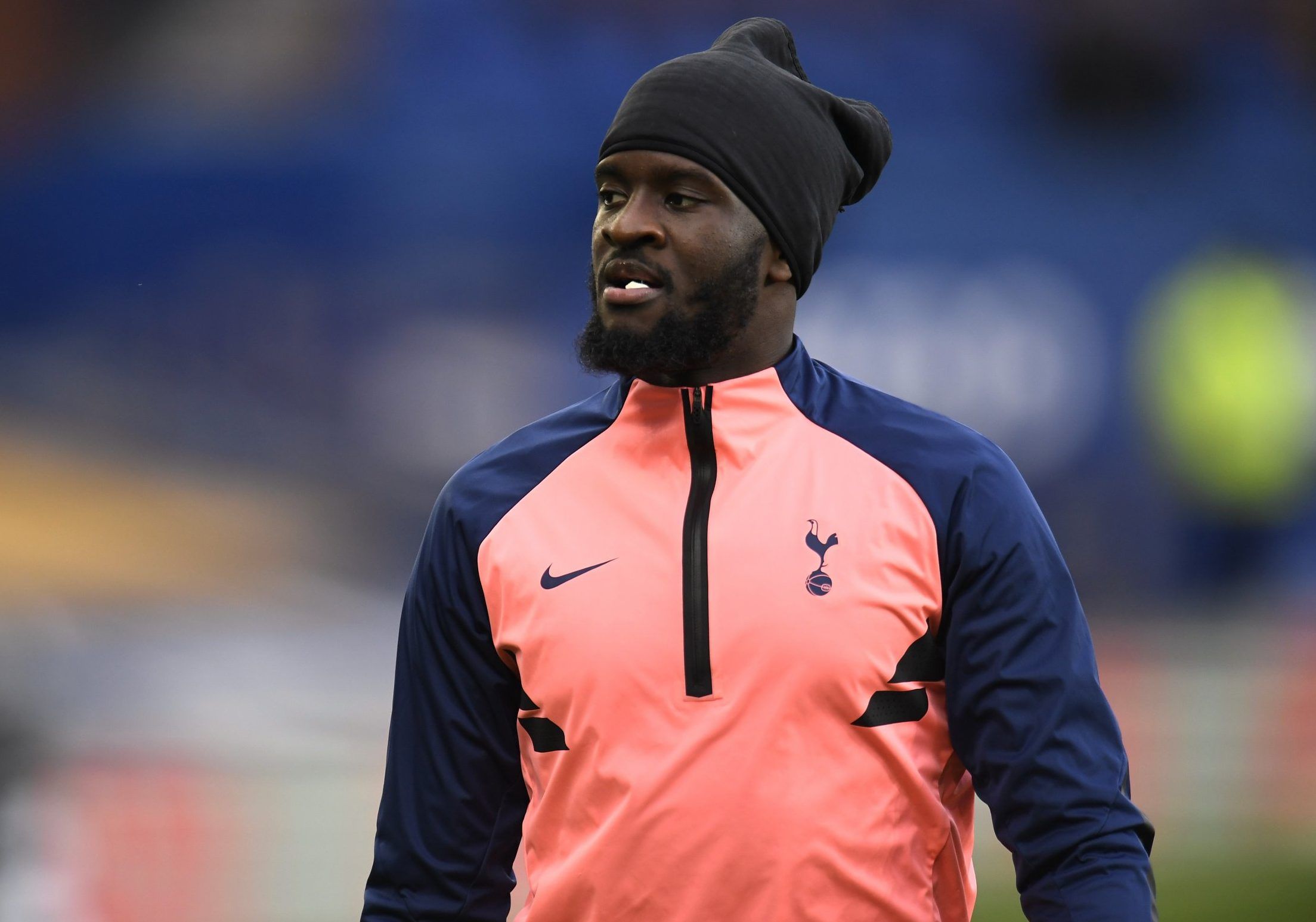 spurs midfielder tanguy ndombele looks on during warm up before kick off against everton in the premier league