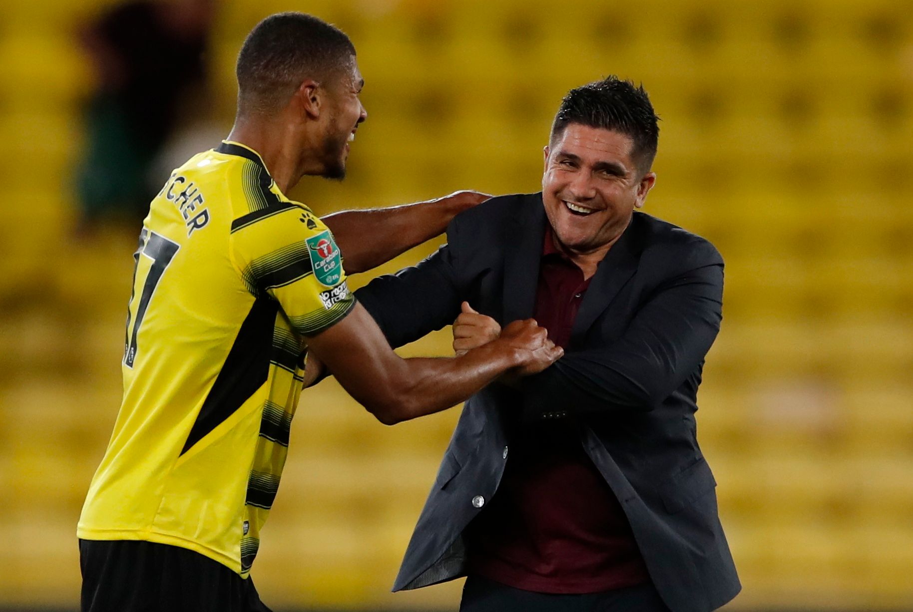 Soccer - England - Carabao Cup Second Round - Watford v Crystal Palace - Vicarage Road, Watford, Britain - August 24, 2021  Watford manager Xisco Munoz celebrates with Ashley Fletcher after the match Action Images via Reuters/Andrew Couldridge