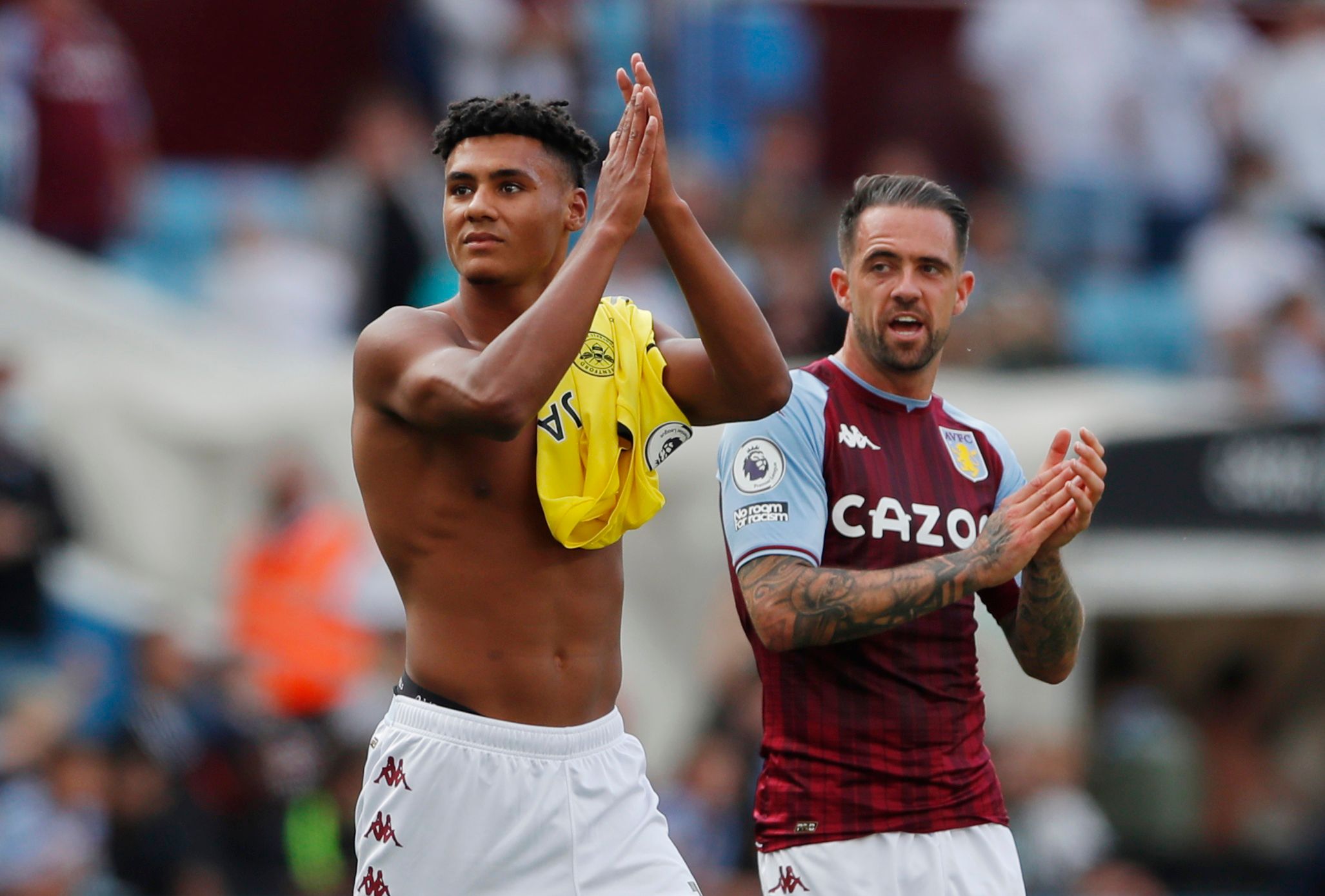 Soccer Football - Premier League - Aston Villa v Brentford - Villa Park, Birmingham, Britain - August 28, 2021 Aston Villa's Ollie Watkins applauds the fans with Danny Ings after the match Action Images via Reuters/Andrew Couldridge EDITORIAL USE ONLY. No use with unauthorized audio, video, data, fixture lists, club/league logos or 'live' services. Online in-match use limited to 75 images, no video emulation. No use in betting, games or single club /league/player publications.  Please contact yo