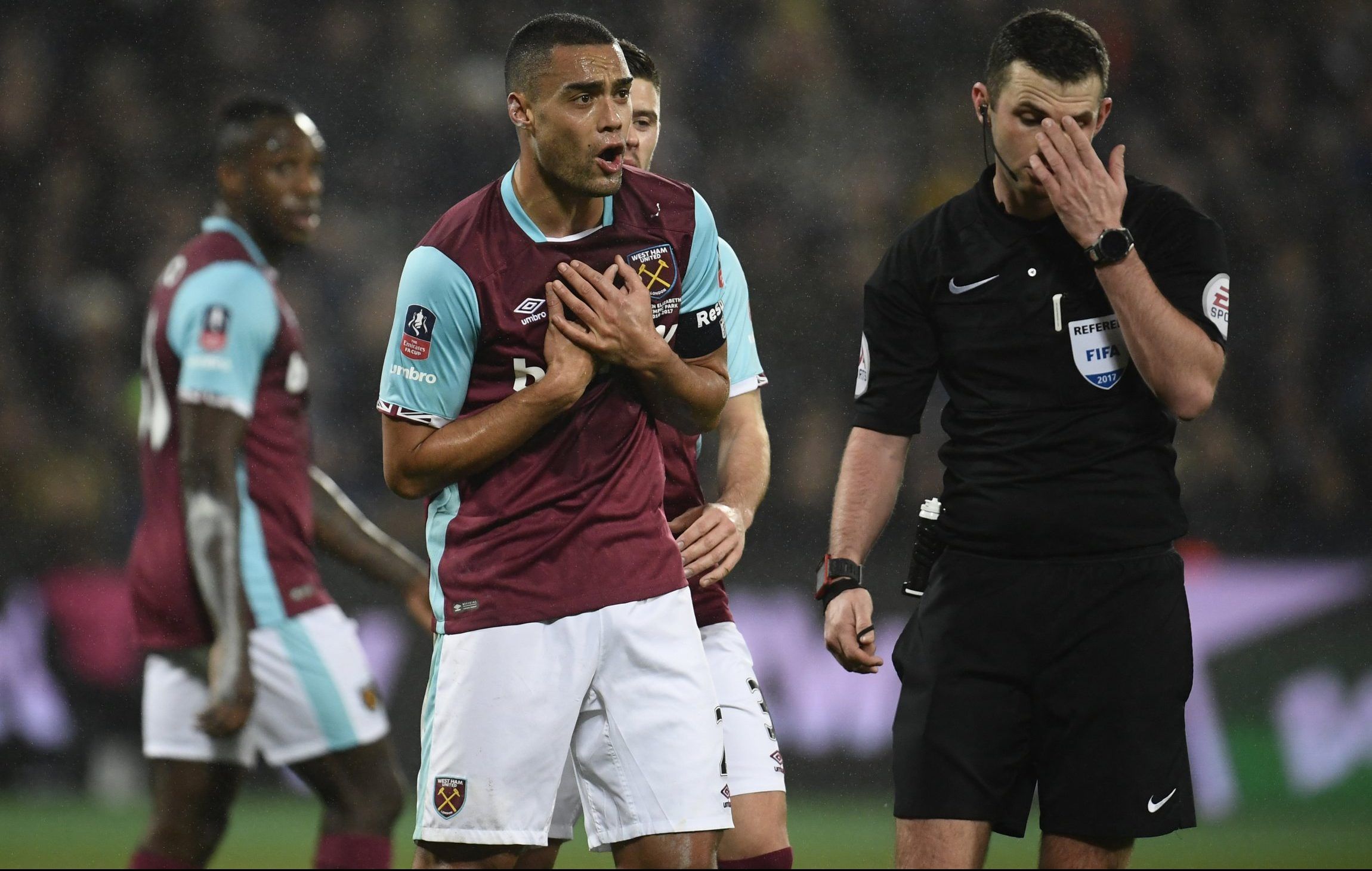 West Ham defender Winston Reid remonstrates with Michael Oliver after Manchester City are awarded a penalty
