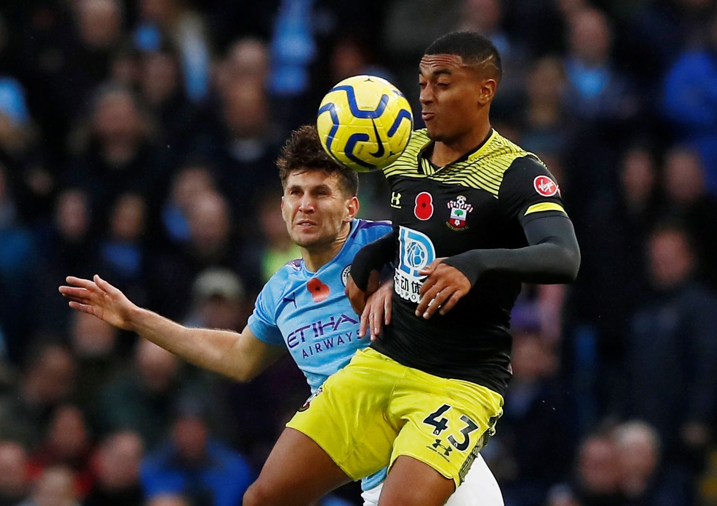 Soccer Football - Premier League - Manchester City v Southampton - Etihad Stadium, Manchester, Britain - November 2, 2019  Southampton's Yan Valery in action with Manchester City's John Stones   Action Images via Reuters/Jason Cairnduff  EDITORIAL USE ONLY. No use with unauthorized audio, video, data, fixture lists, club/league logos or 