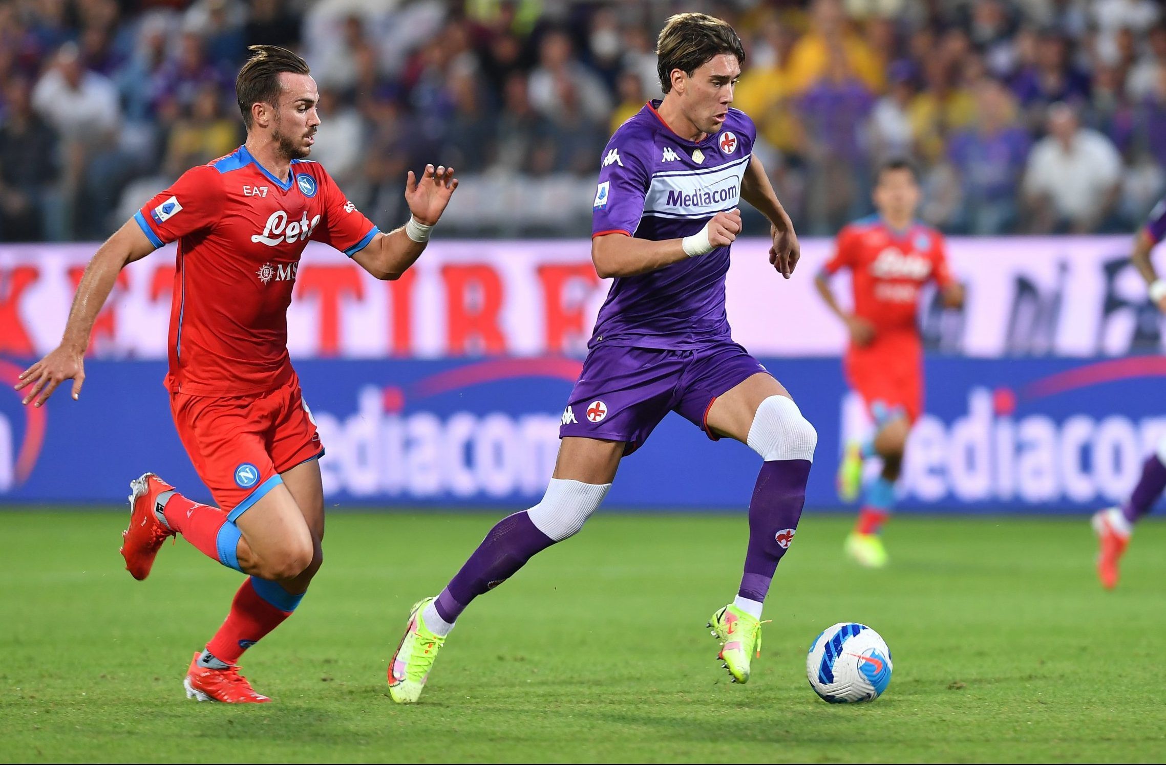 Fiorentina striker Dusan Vlahovic on the ball against Napoli's Fabian Ruiz in the Serie A