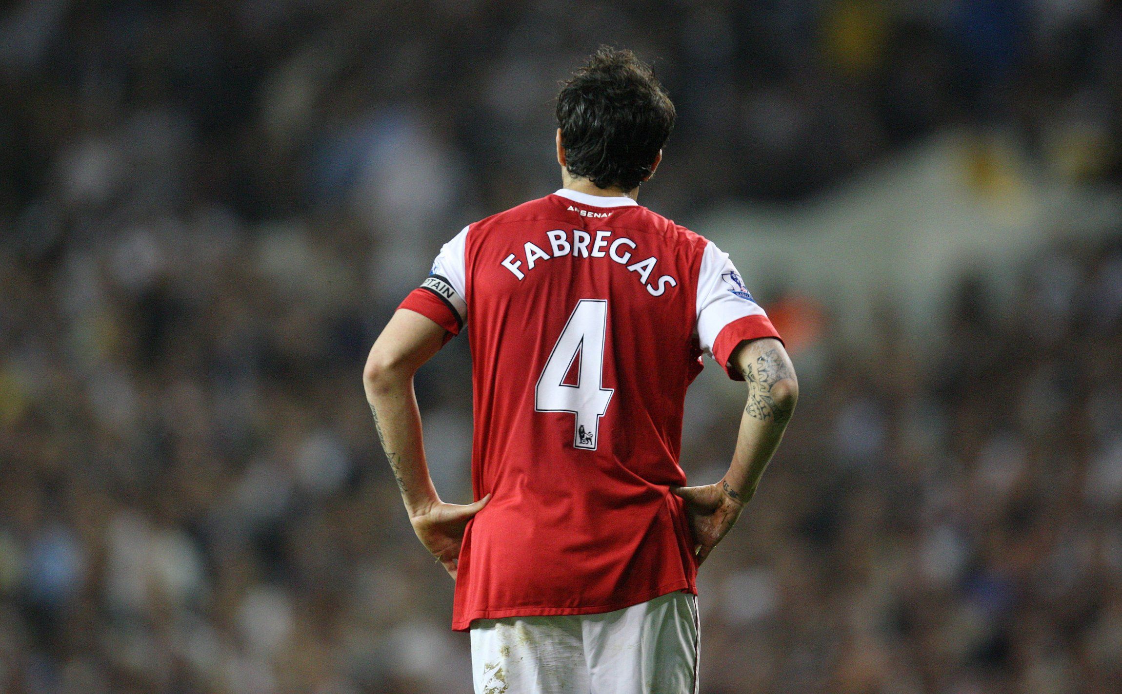 Former-Arsenal-midfielder-Cesc-Fabregas-looks-on-against-Spurs