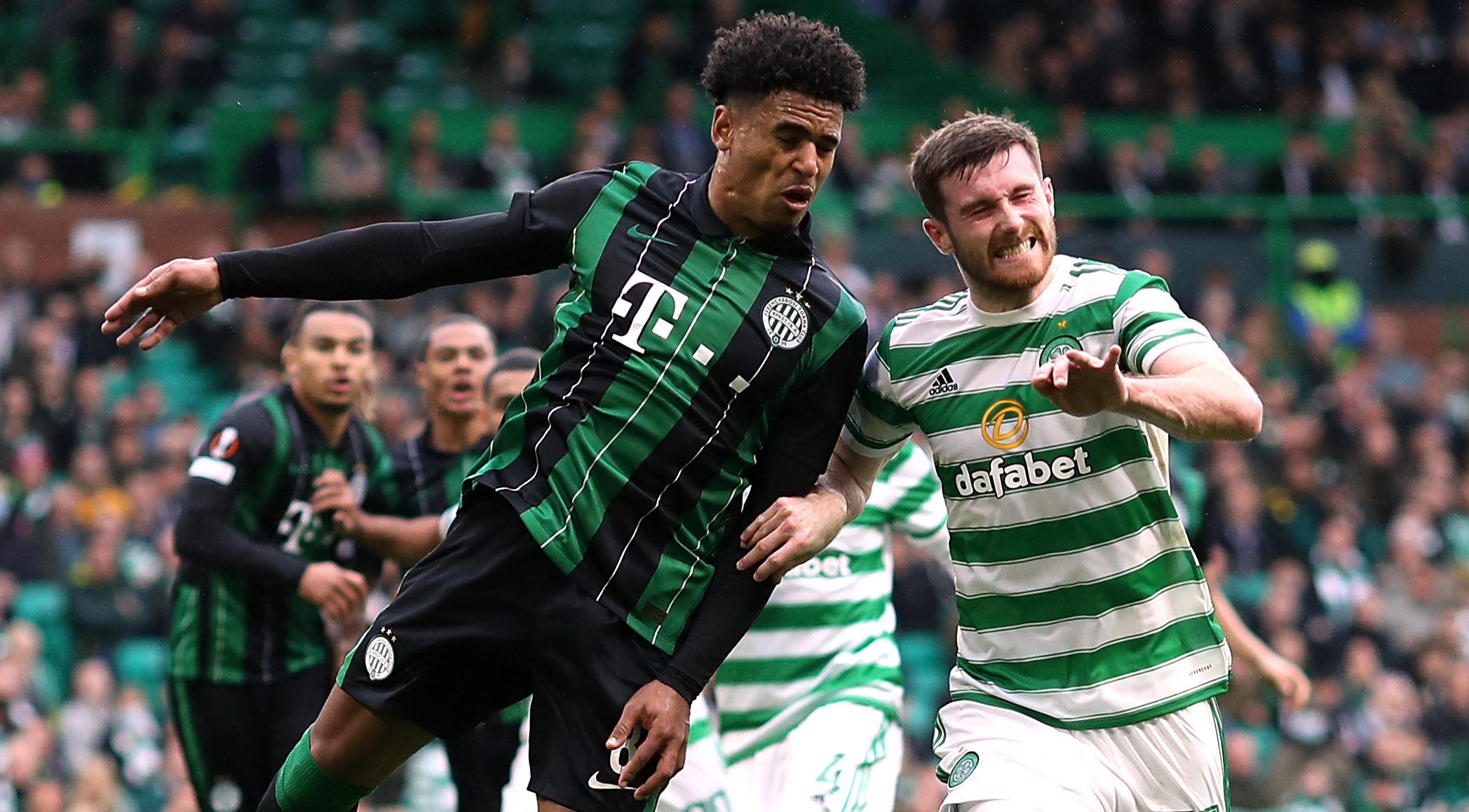 Soccer Football - Europa League - Group G - Celtic v Ferencvaros - Celtic Park, Glasgow, Scotland, Britain - October 19, 2021 Ferencvaros' Ryan Mmaee in action with Celtic's Anthony Ralston REUTERS/Russell Cheyne