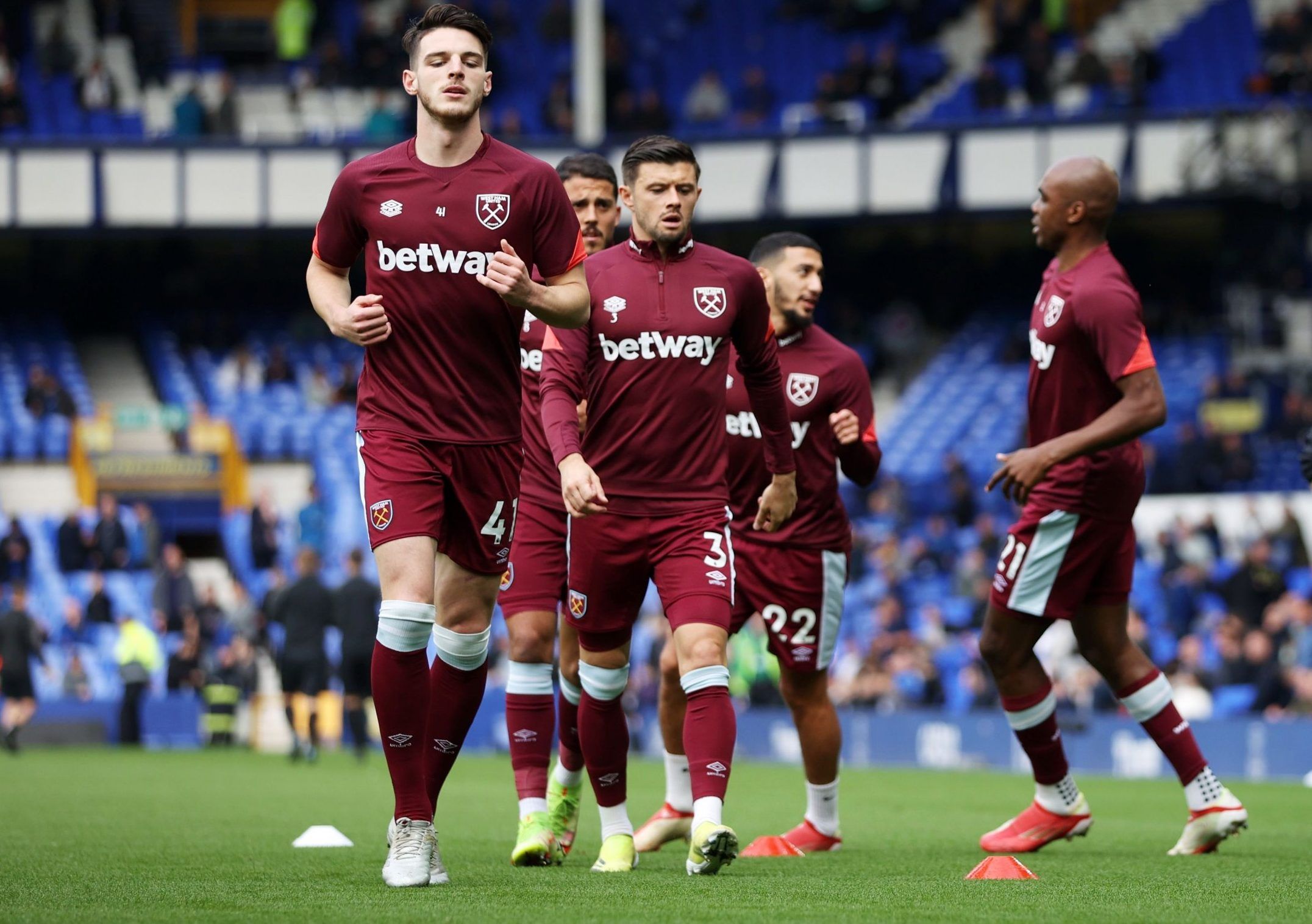 West Ham stars Declan Rice and Aaron Cresswell warm up before their Premier League clash against Everton at Goodison Park