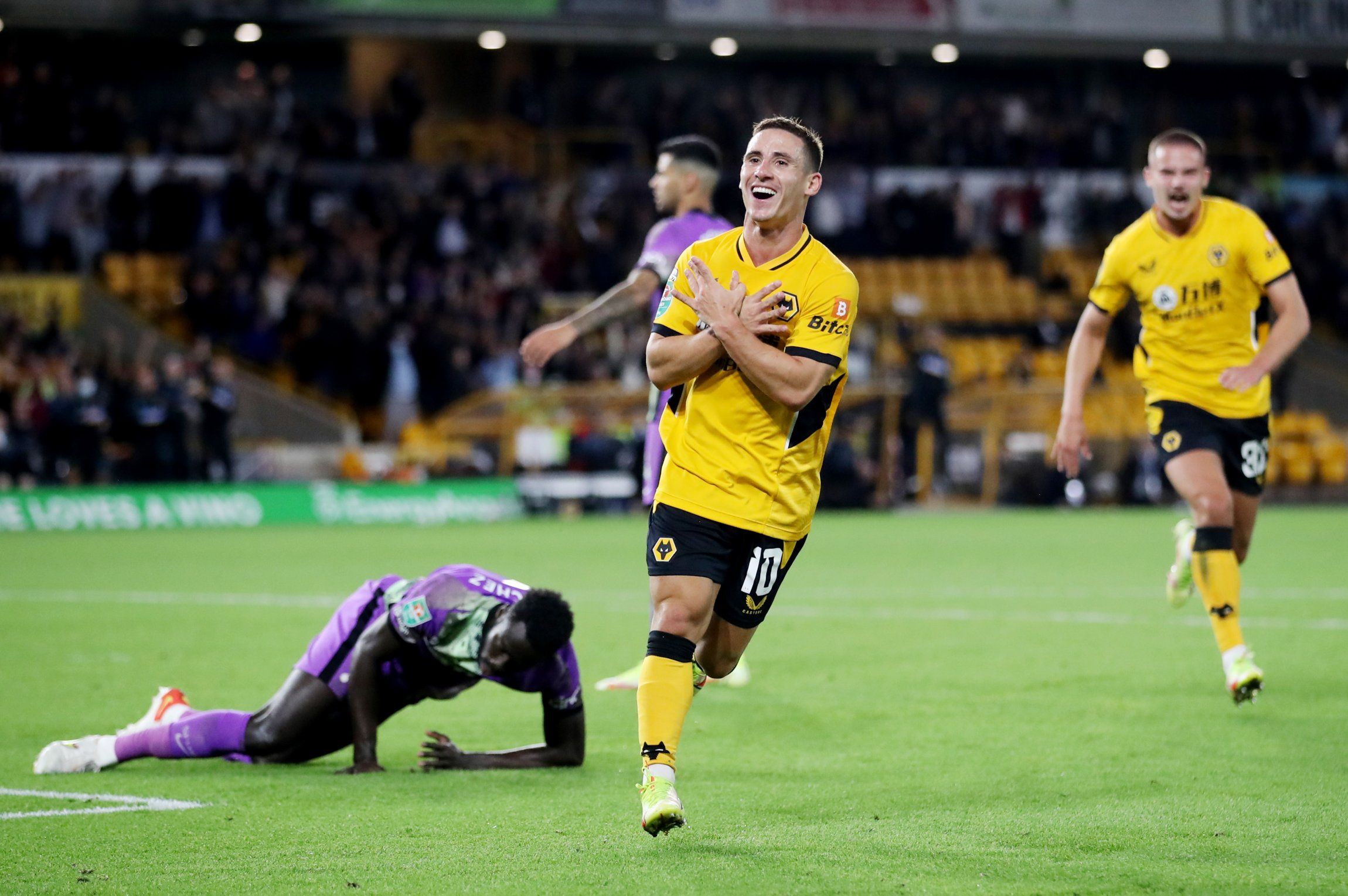 Wolves player Daniel Podence in Premier League action