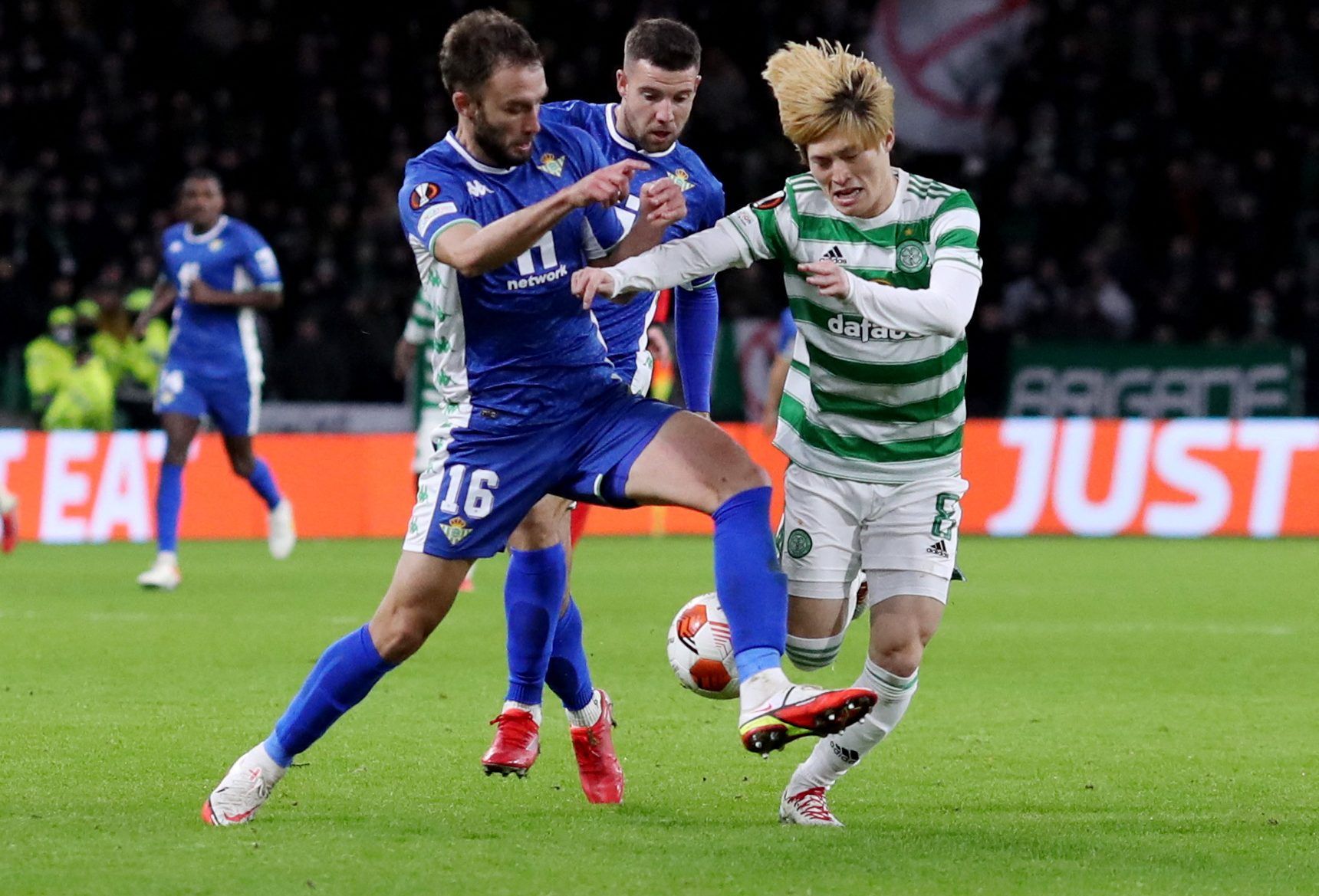 Soccer Football - Europa League - Group G - Celtic v Real Betis - Celtic Park, Glasgow, Scotland, Britain - December 9, 2021 Celtic's Kyogo Furuhashi in action with Real Betis' German Pezzella REUTERS/Russell Cheyne