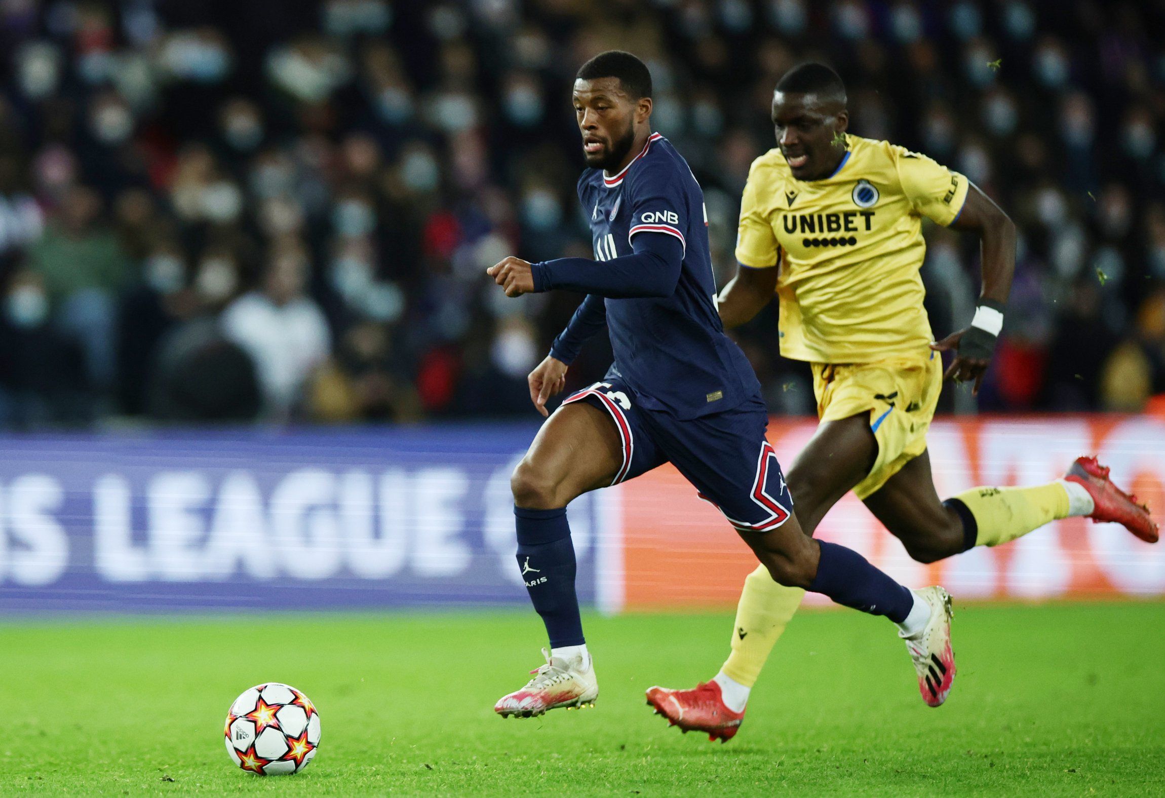 Paris Saint Germain midfielder Gini Wijnaldum in action against Club Brugge