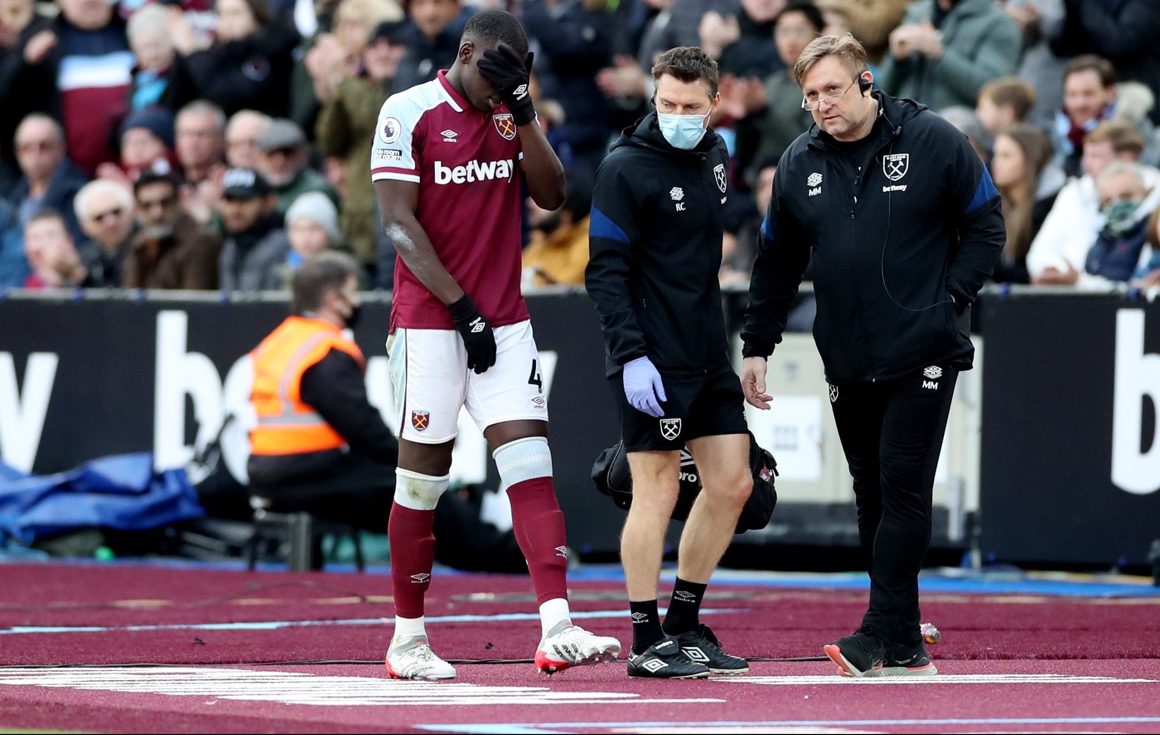 West Ham's Kurt Zouma is gutted as he is substituted following injury against Chelsea