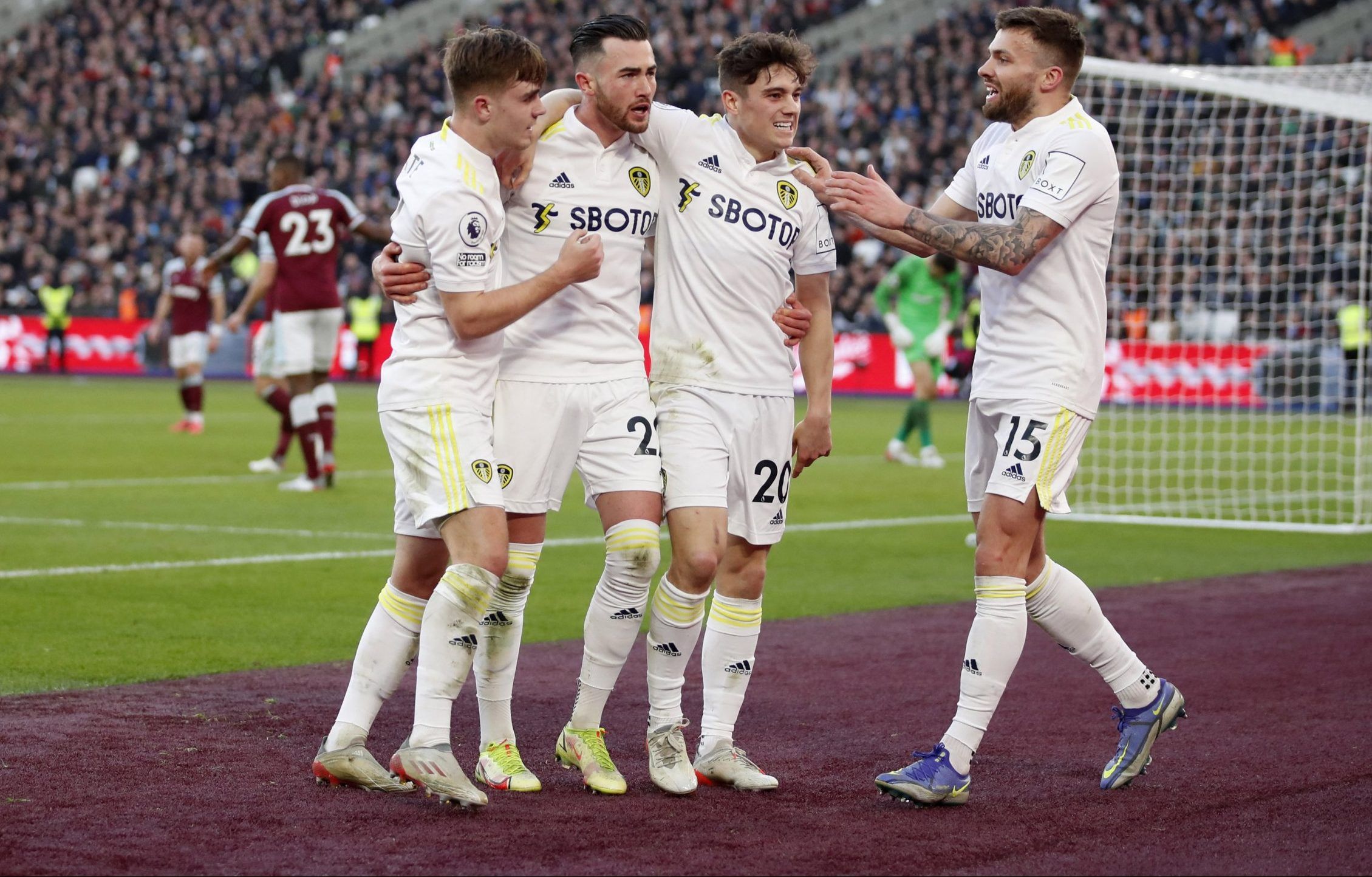 Leeds players celebrate with Jack Harrison after goal against West Ham