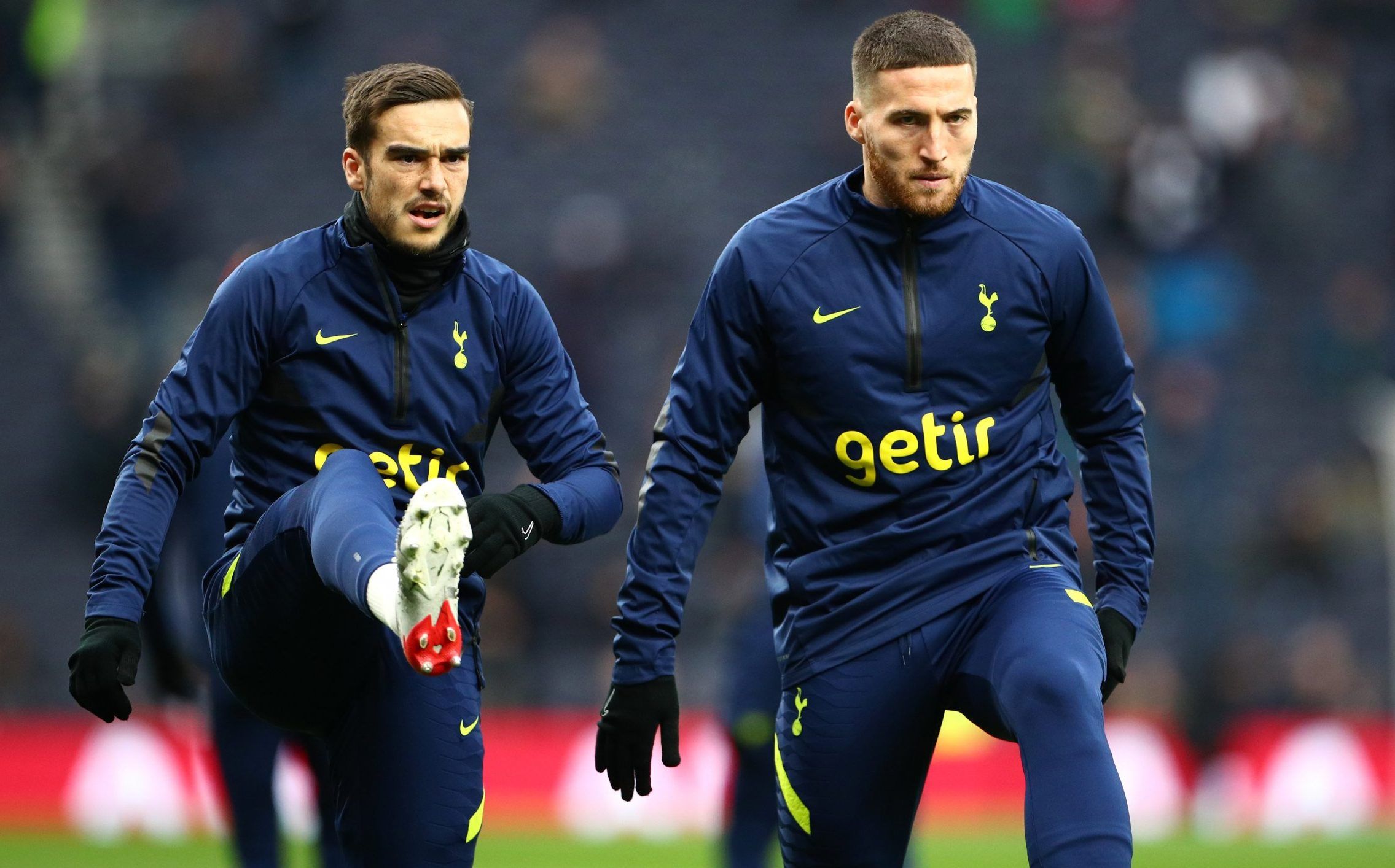 Spurs stars Matt Doherty and Harry Winks warm up before Norwich City clash