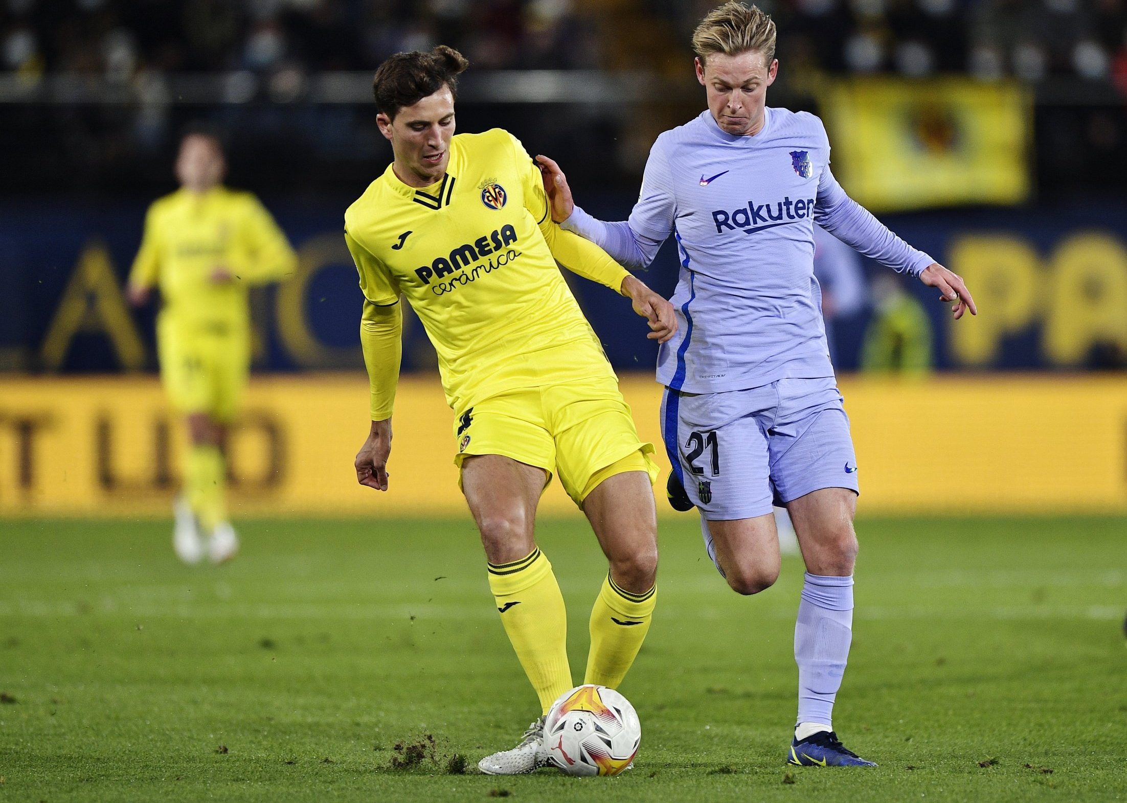 Villarreal defender Pau Torres battles Barcelona midfielder Frenkie de Jong