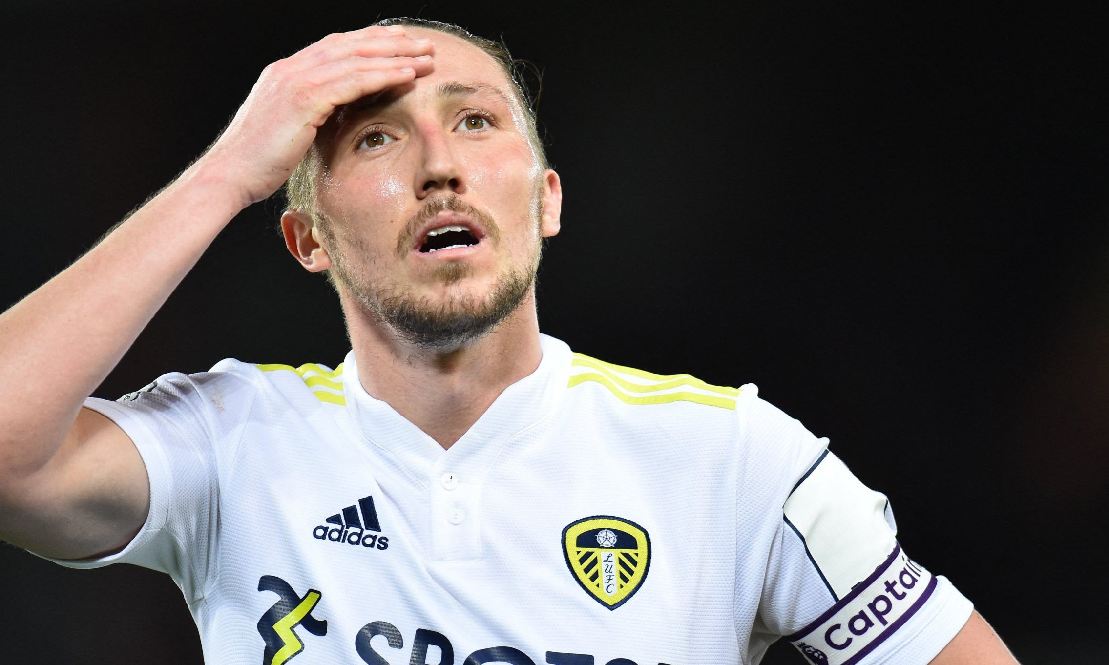 Leeds United defender Luke Ayling reacts against Liverpool after defeat