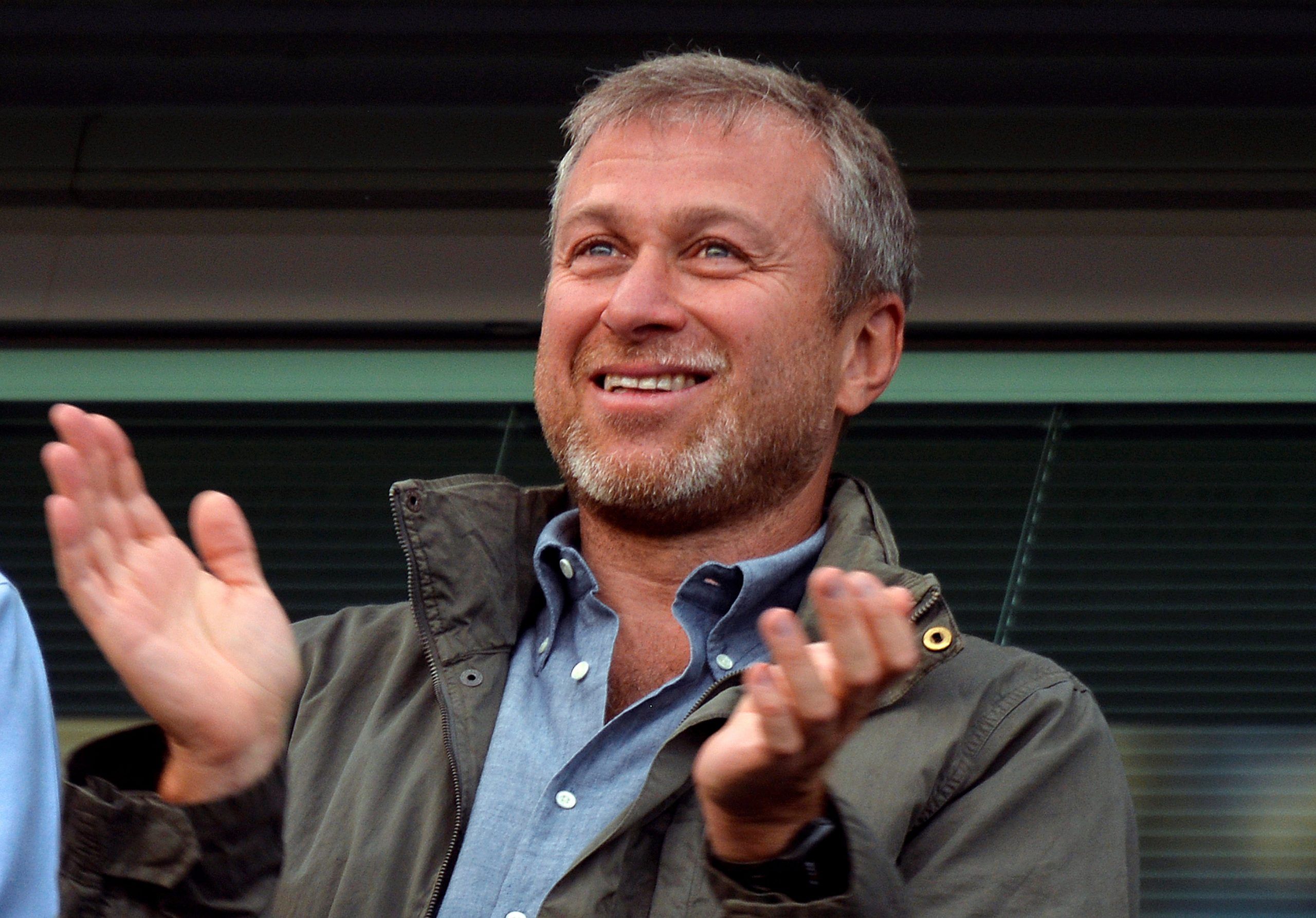 FILE PHOTO: Chelsea owner Roman Abramovich applauds after the English Premier League soccer match between Chelsea and Hull City at Stamford Bridge in London August 18, 2013. REUTERS/Toby Melville/File photo NO USE WITH UNAUTHORIZED AUDIO, VIDEO, DATA, FIXTURE LISTS, CLUB/LEAGUE LOGOS OR 
