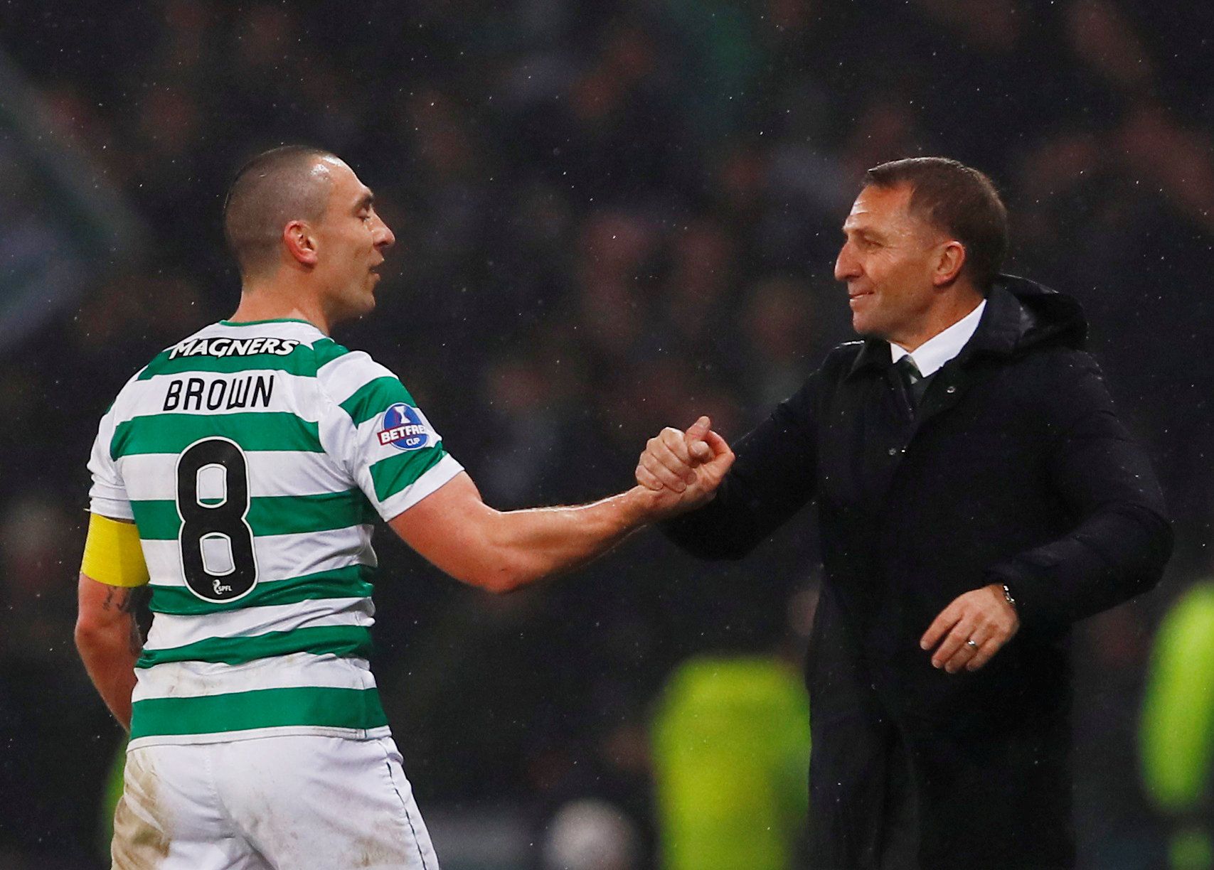 Soccer Football - Scottish League Cup Final - Aberdeen v Celtic - Hampden Park, Glasgow, Britain - December 2, 2018  Celtic's Scott Brown celebrates with manager Brendan Rodgers at the end of the match   Action Images via Reuters/Jason Cairnduff