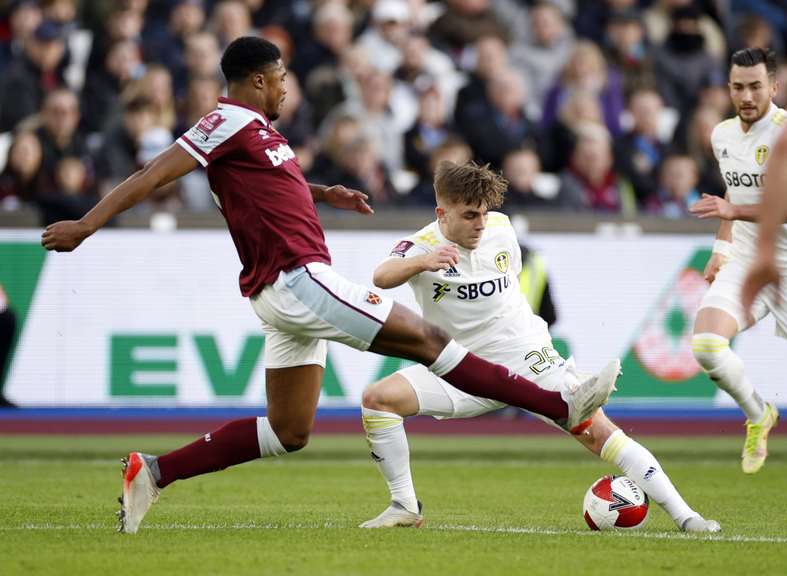 Soccer Football - FA Cup Third Round - West Ham United v Leeds United - London Stadium, London, Britain - January 9, 2022 West Ham United's Ben Johnson in action with Leeds United's Lewis Bate Action Images via Reuters/John Sibley