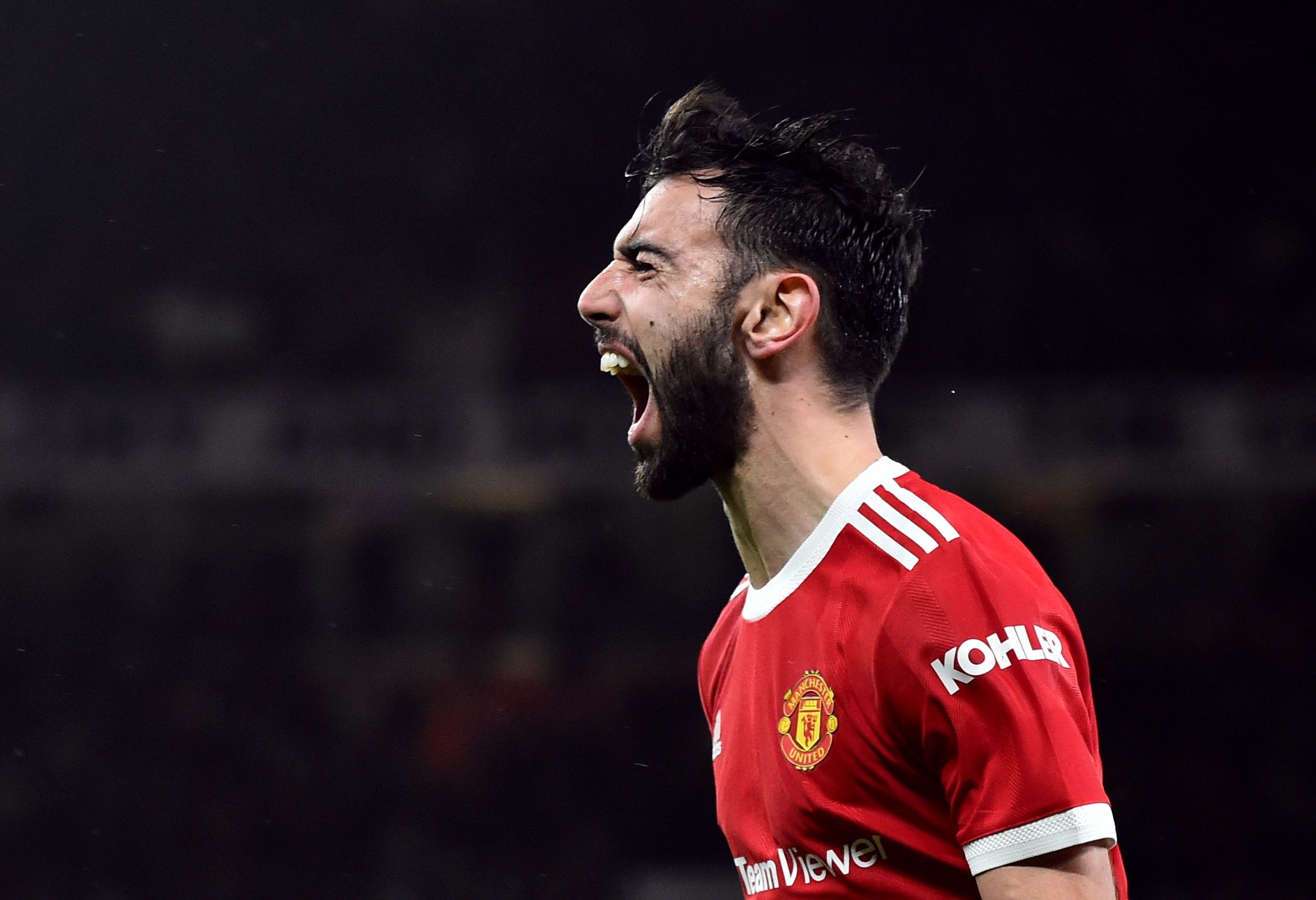 Soccer Football - Premier League - Manchester United v Brighton &amp; Hove Albion - Old Trafford, Manchester, Britain - February 15, 2022  Manchester United's Bruno Fernandes celebrates scoring their second goal REUTERS/Peter Powell EDITORIAL USE ONLY. No use with unauthorized audio, video, data, fixture lists, club/league logos or 'live' services. Online in-match use limited to 75 images, no video emulation. No use in betting, games or single club /league/player publications.  Please contact yo