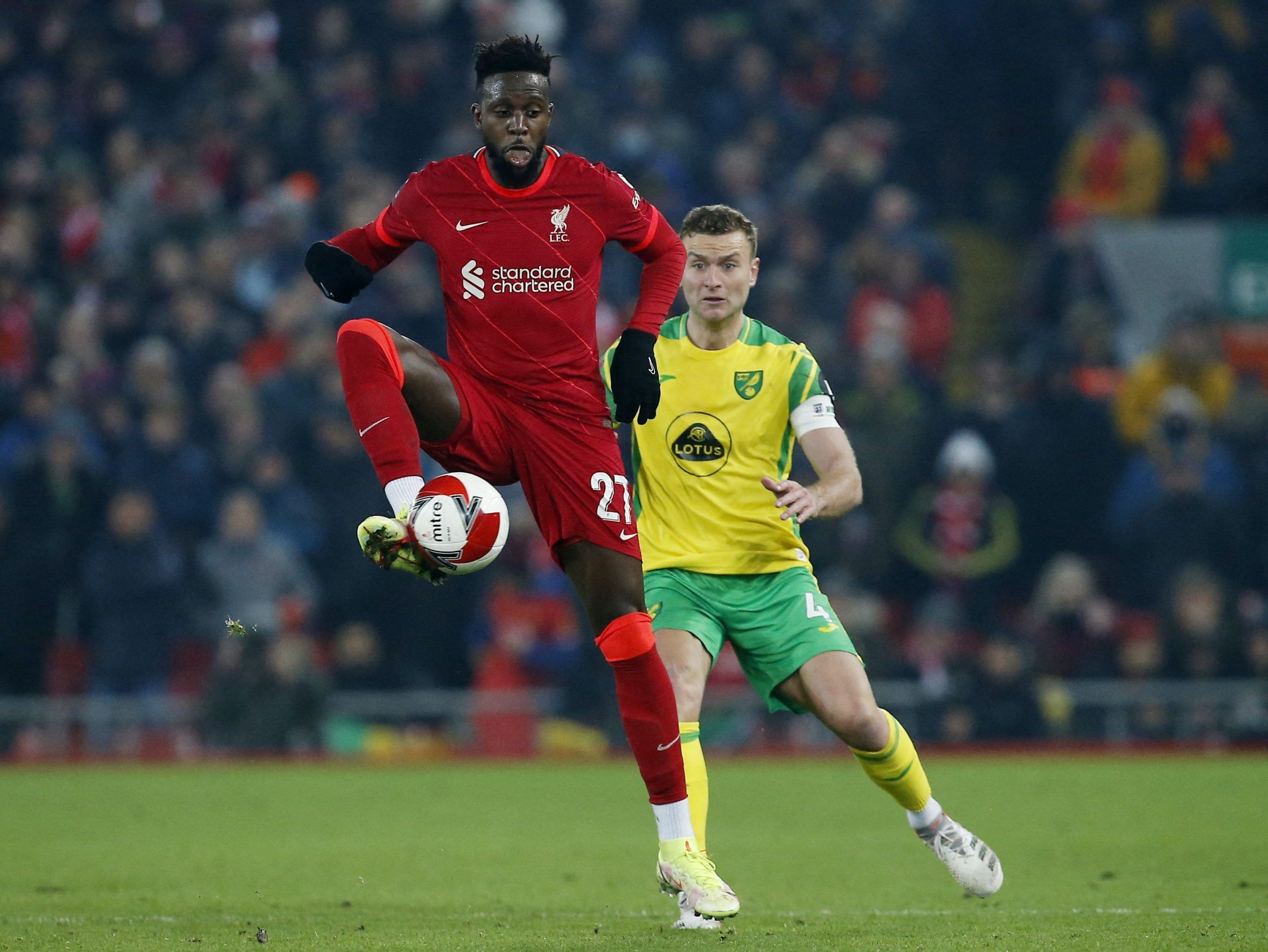 Soccer Football - FA Cup Fifth Round - Liverpool v Norwich City - Anfield, Liverpool, Britain - March 2, 2022 Liverpool's Divock Origi in action with Norwich City's Ben Gibson REUTERS/Craig Brough