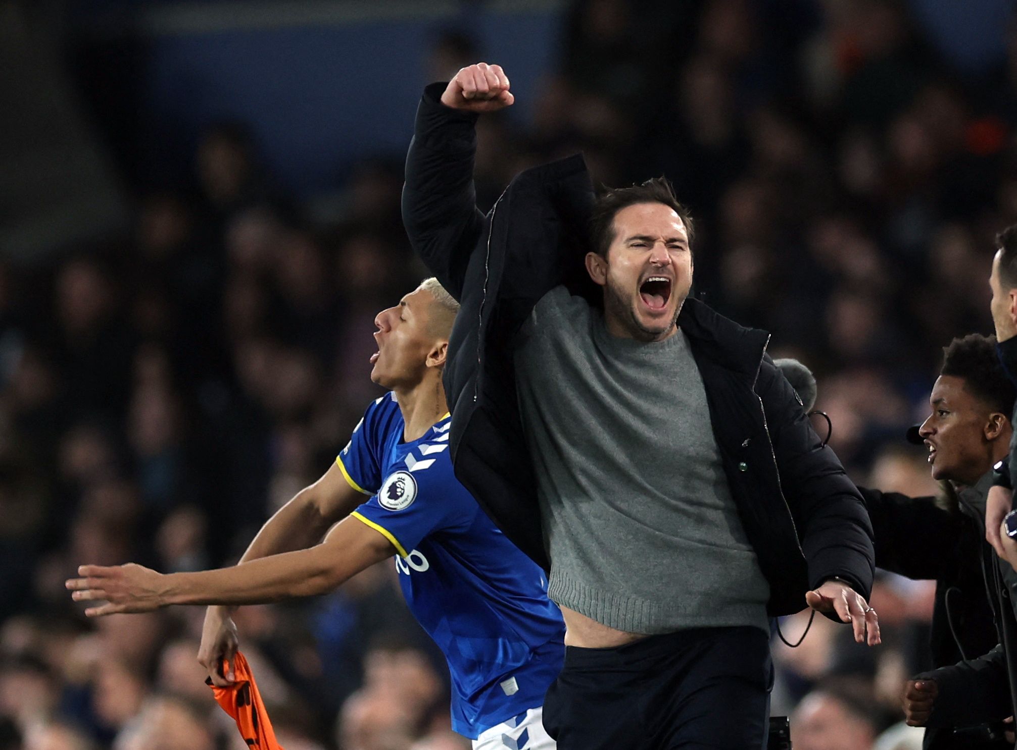 Soccer Football - Premier League - Everton v Newcastle United - Goodison Park, Liverpool, Britain - March 17, 2022 Everton manager Frank Lampard and Richarlison celebrate after the match Action Images via Reuters/Lee Smith EDITORIAL USE ONLY. No use with unauthorized audio, video, data, fixture lists, club/league logos or 'live' services. Online in-match use limited to 75 images, no video emulation. No use in betting, games or single club /league/player publications.  Please contact your account